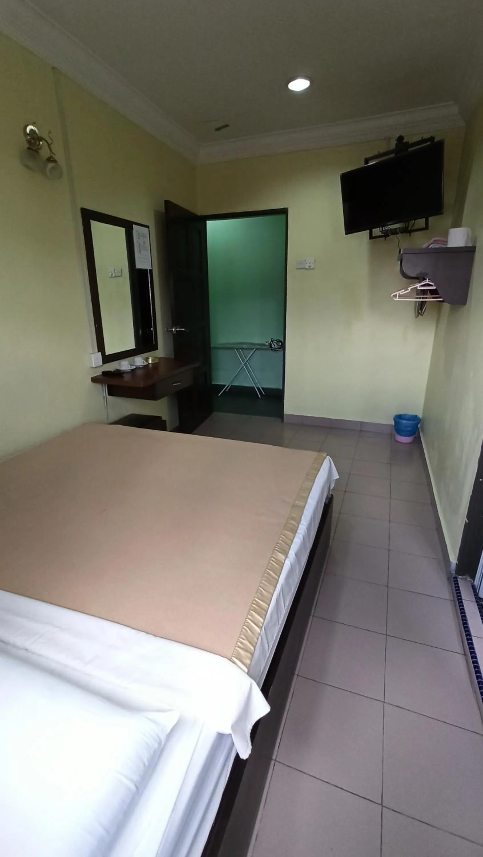 Bed in Ria Cameron Hotel