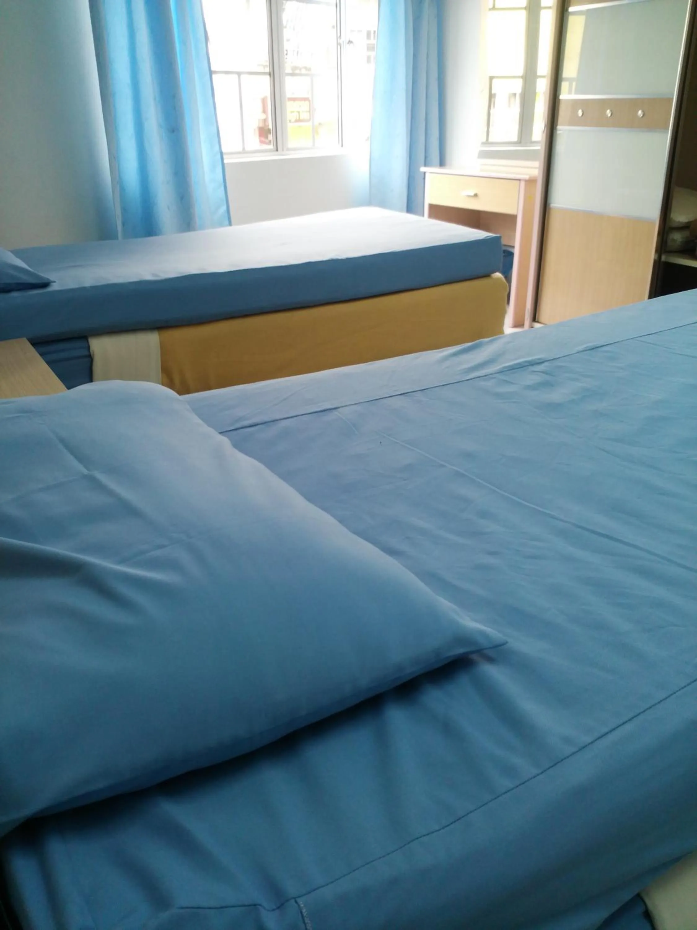 Bed in Ria Cameron Hotel