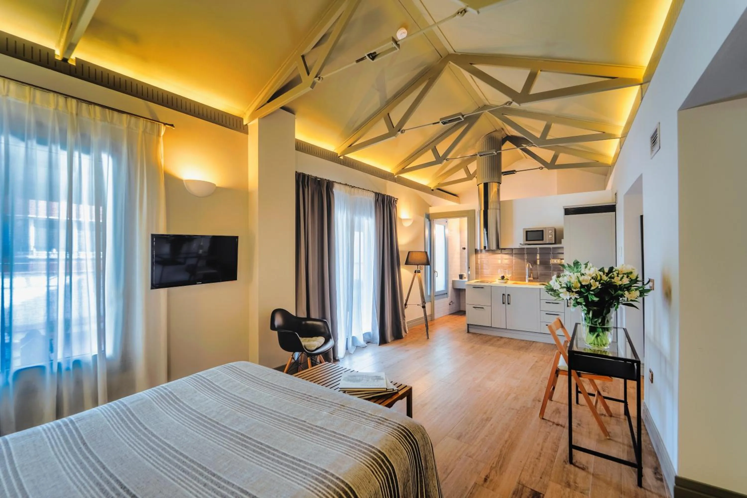 Bed in Blue Windows House Apartamentos & Suites