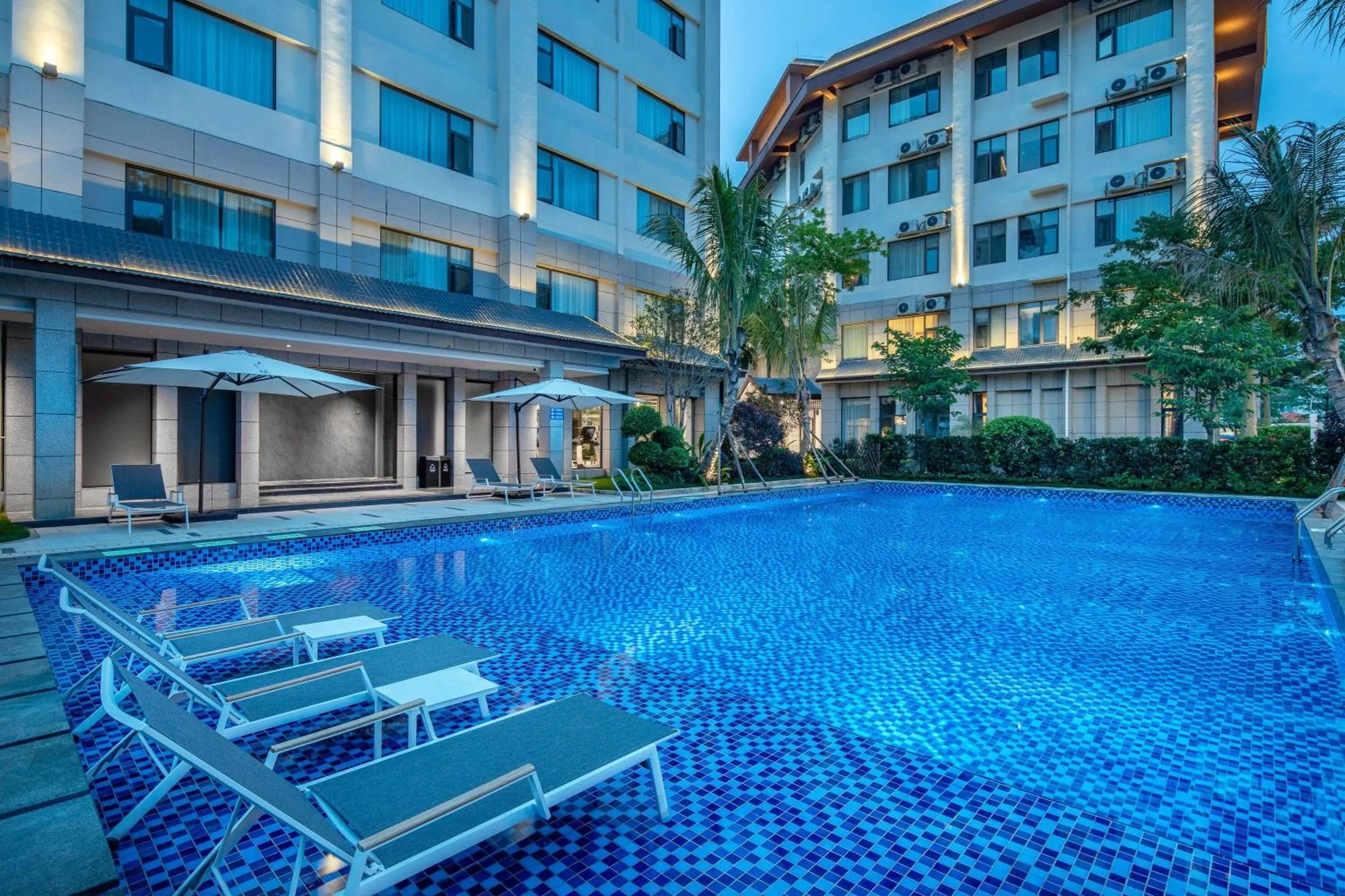 Pool view in Hawthorn by Wyndham Xishuang Banna Jinghong