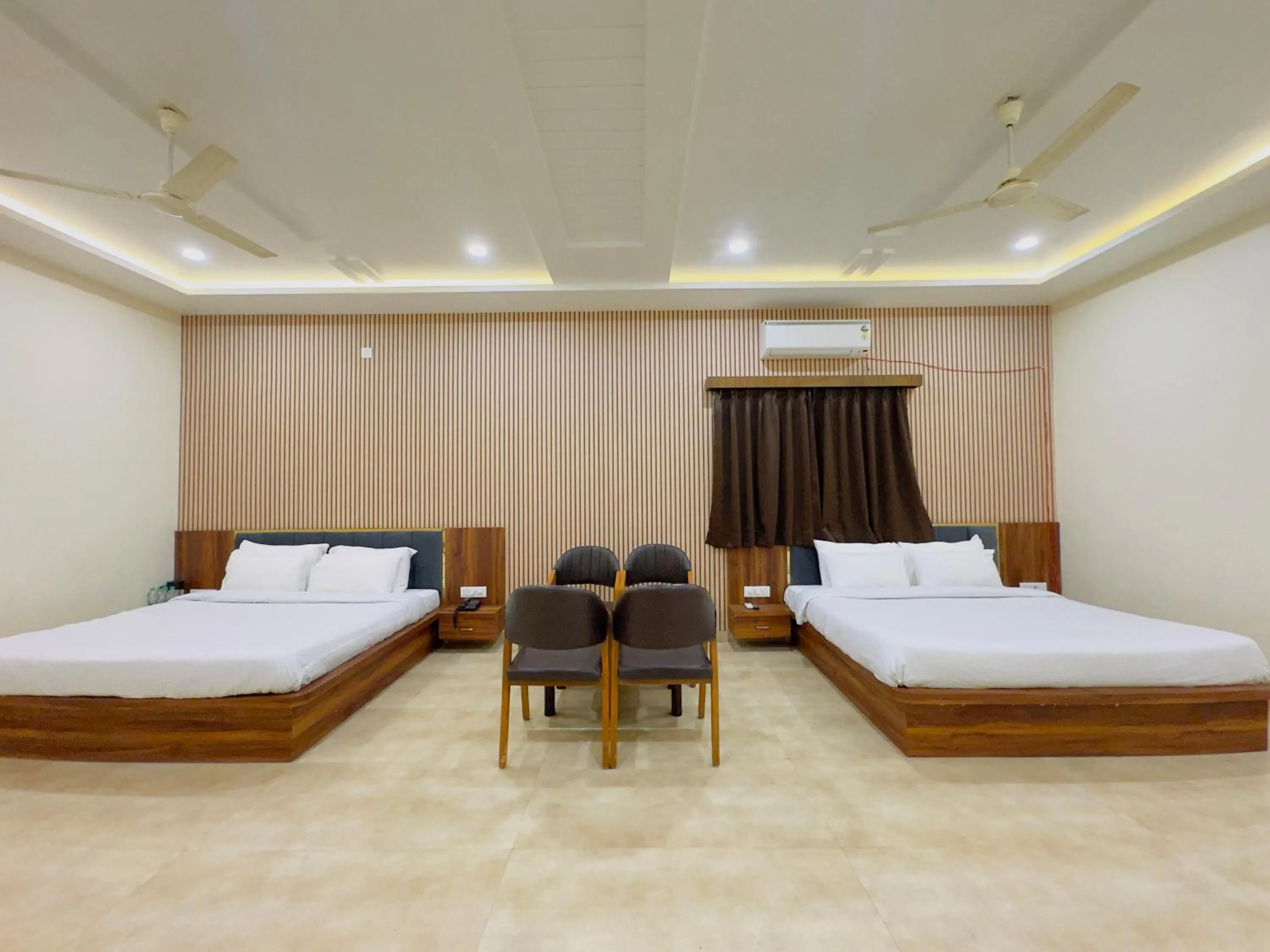 Bedroom, Bed in Hotel Jyotirlinga- One Way Drop to Mahakal Temple