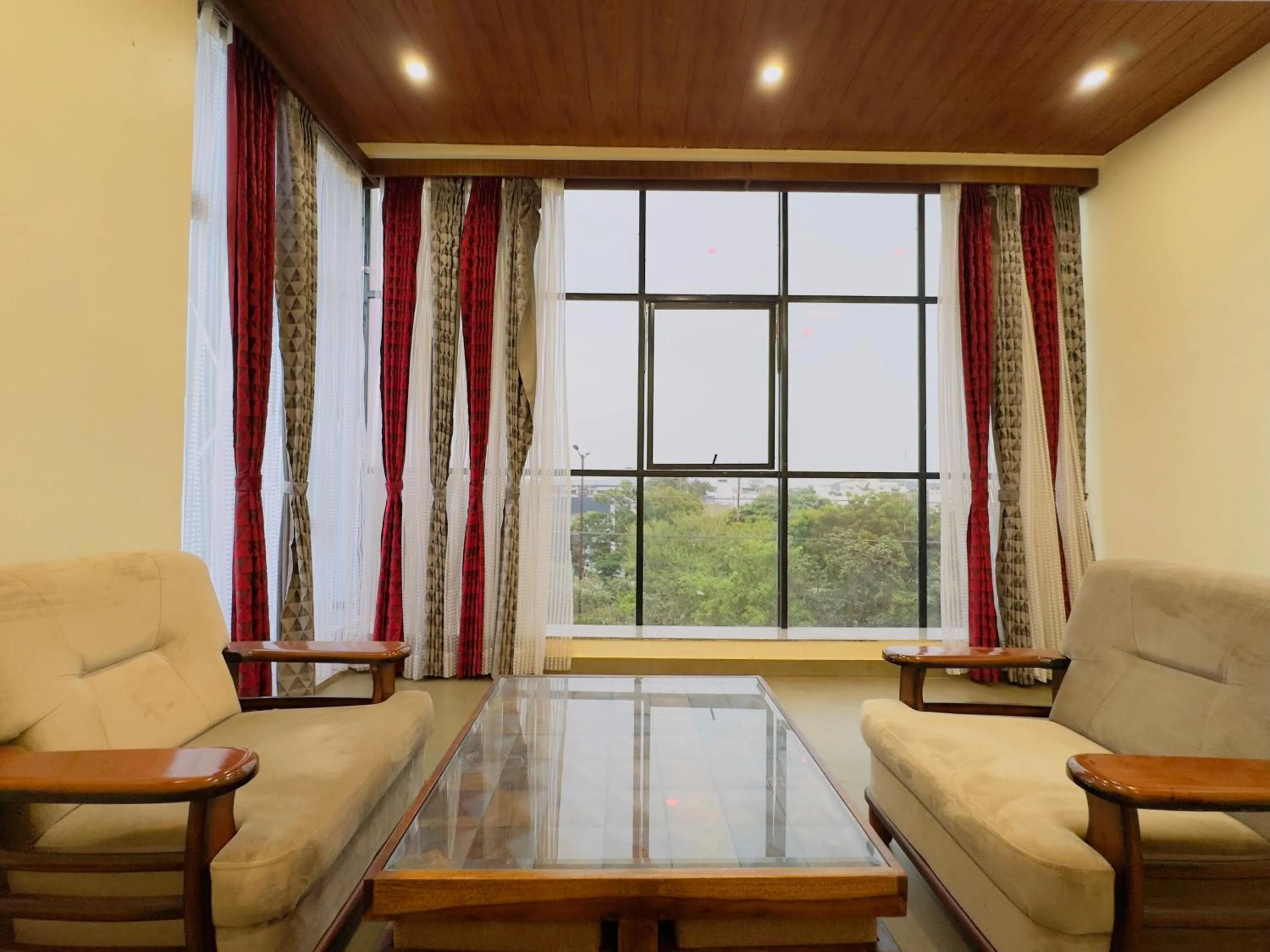 Living room in Hotel Jyotirlinga- One Way Drop to Mahakal Temple