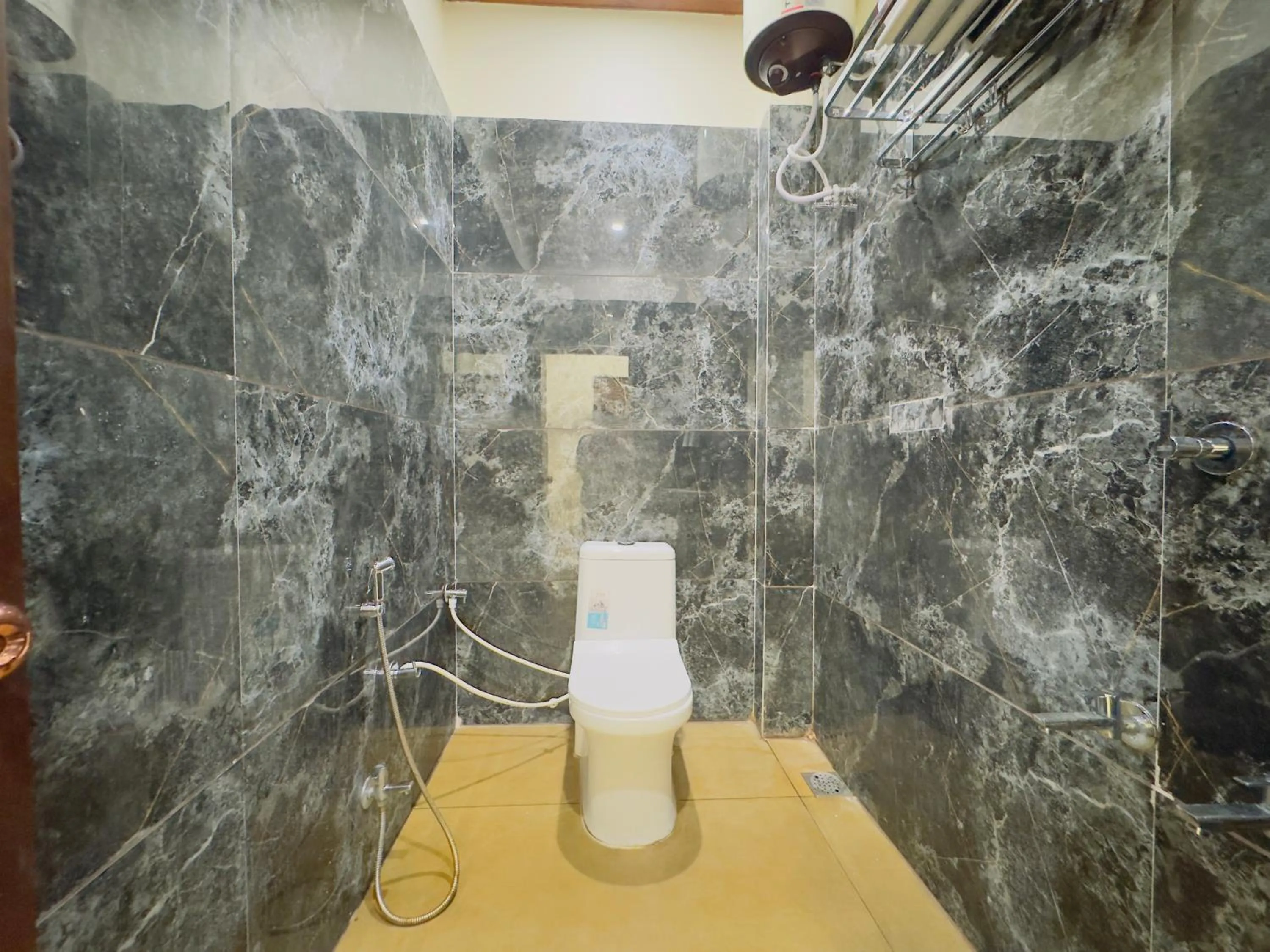 Toilet in Hotel Jyotirlinga- One Way Drop to Mahakal Temple