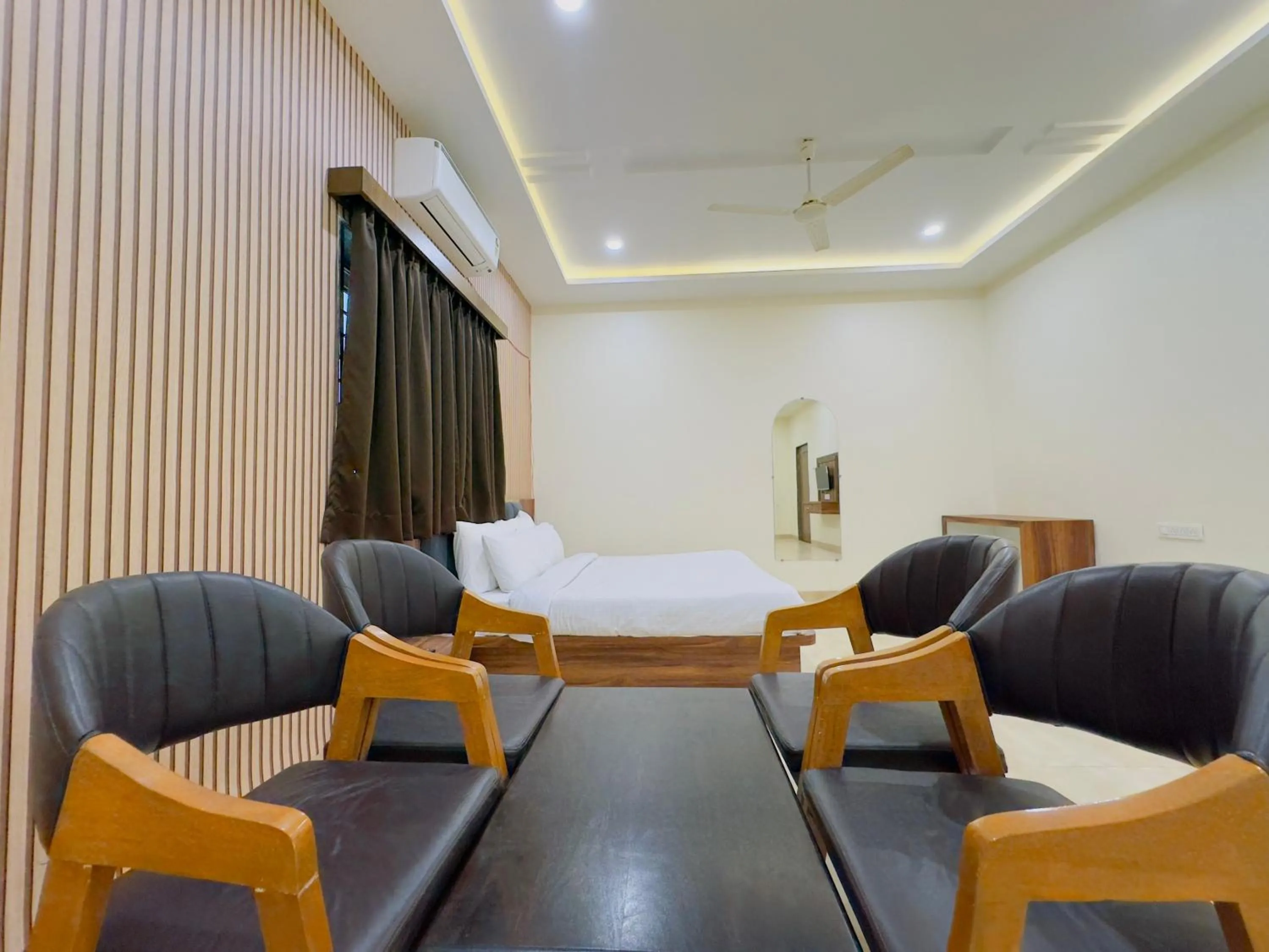 Living room in Hotel Jyotirlinga- One Way Drop to Mahakal Temple