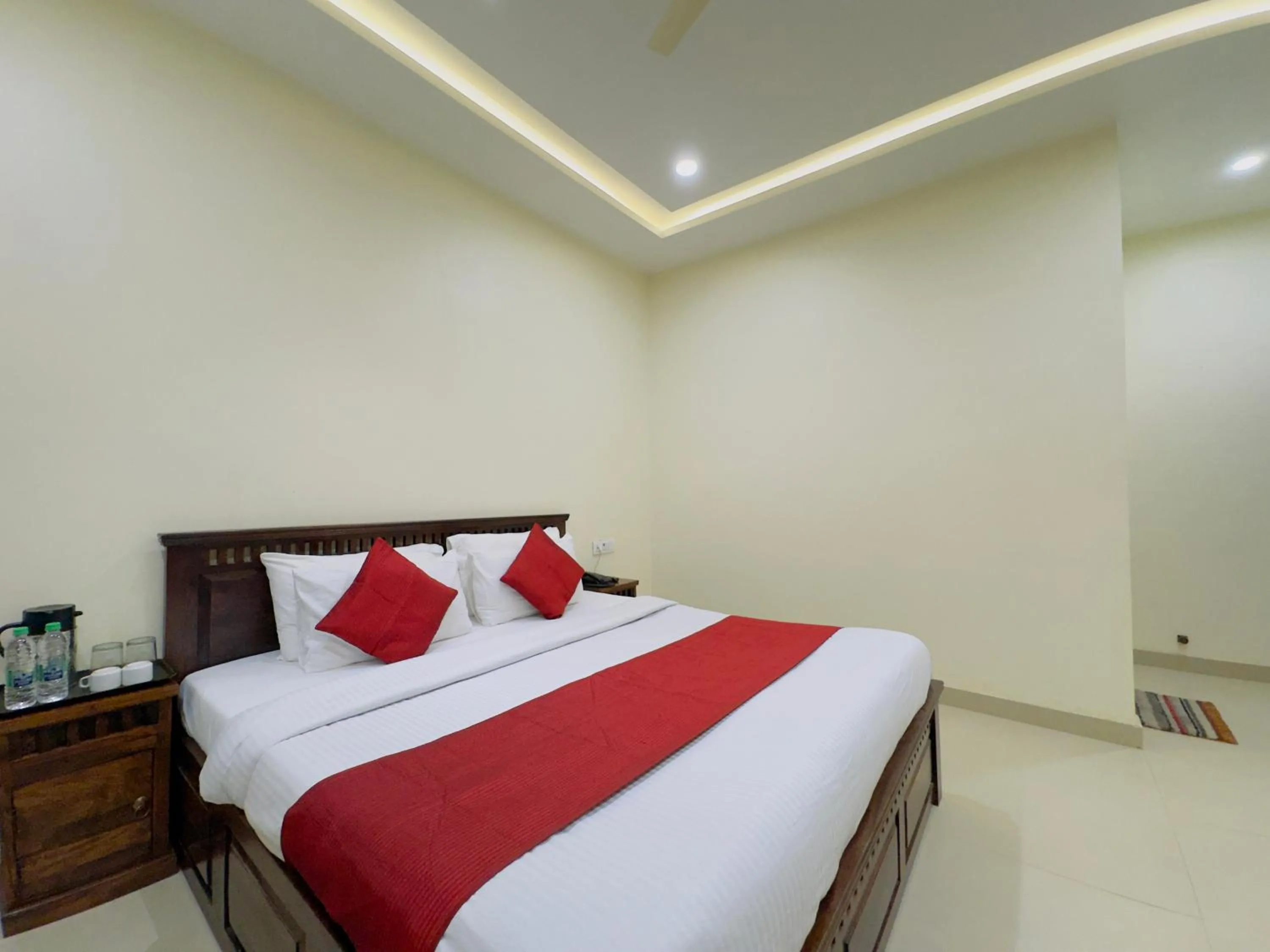 Photo of the whole room, Bed in Hotel Jyotirlinga- One Way Drop to Mahakal Temple