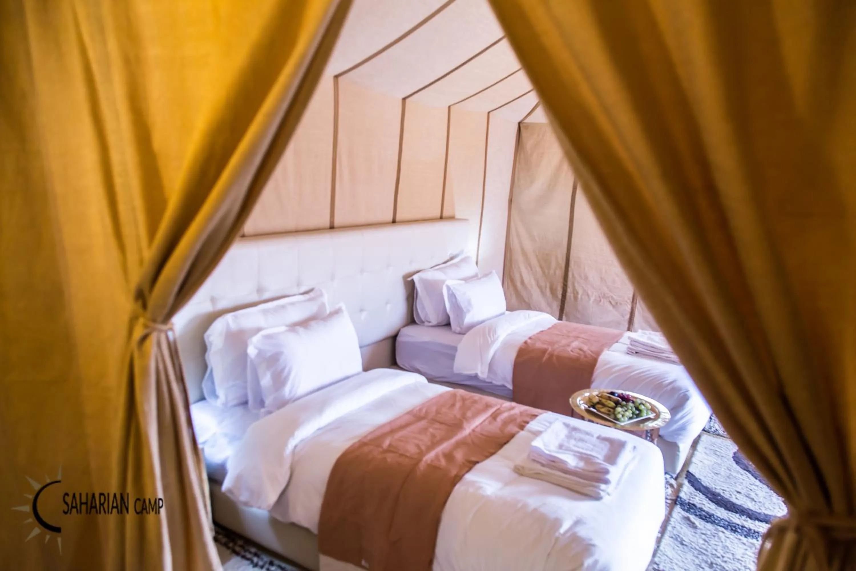 Bed in Merzouga Luxury Camp