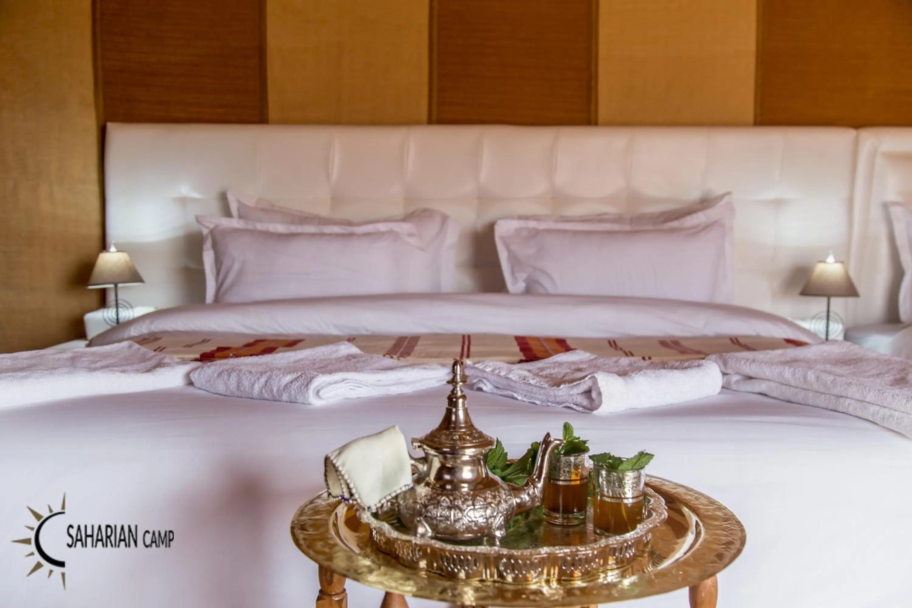Bed in Merzouga Luxury Camp