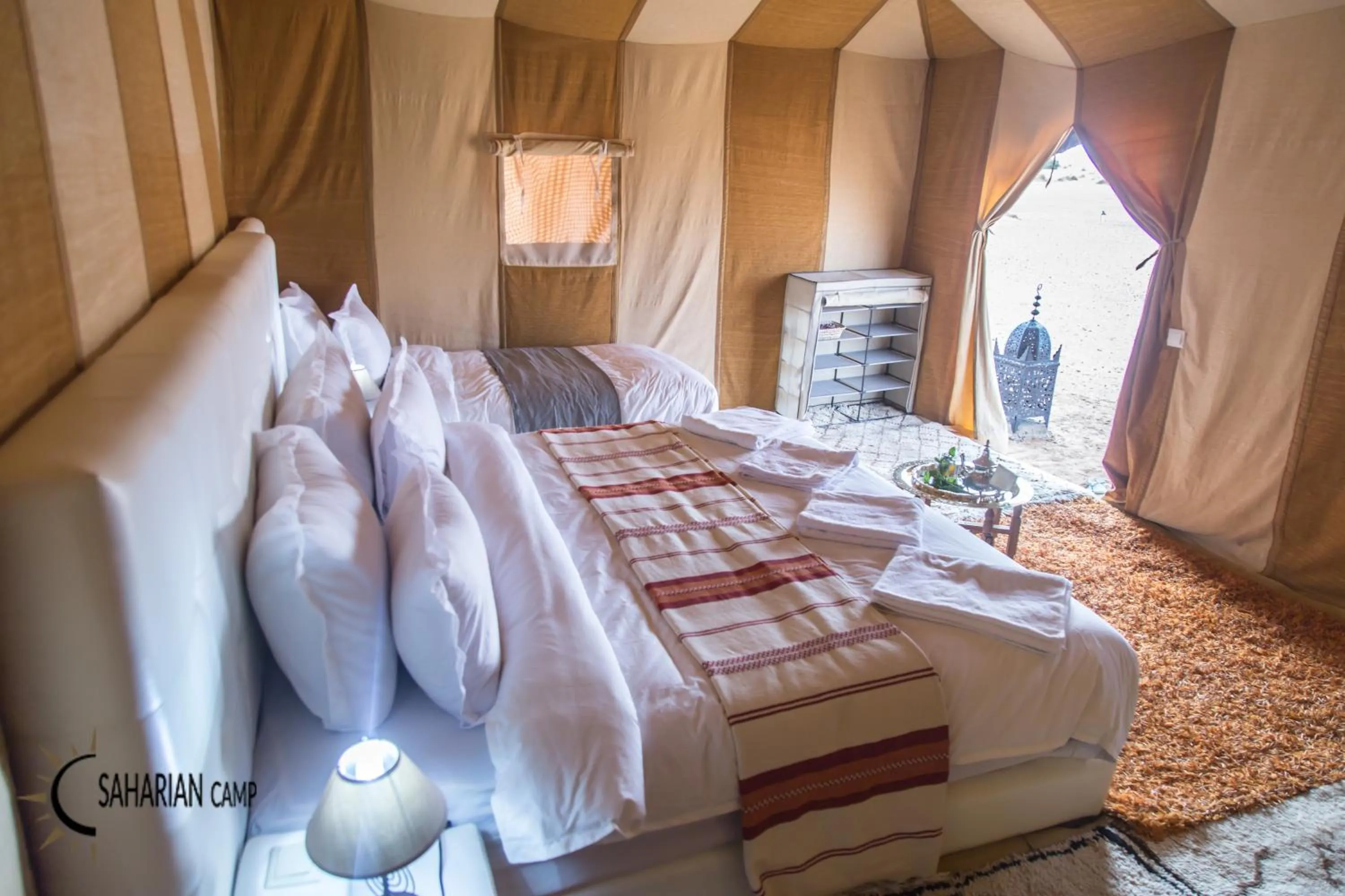 Photo of the whole room, Bed in Merzouga Luxury Camp