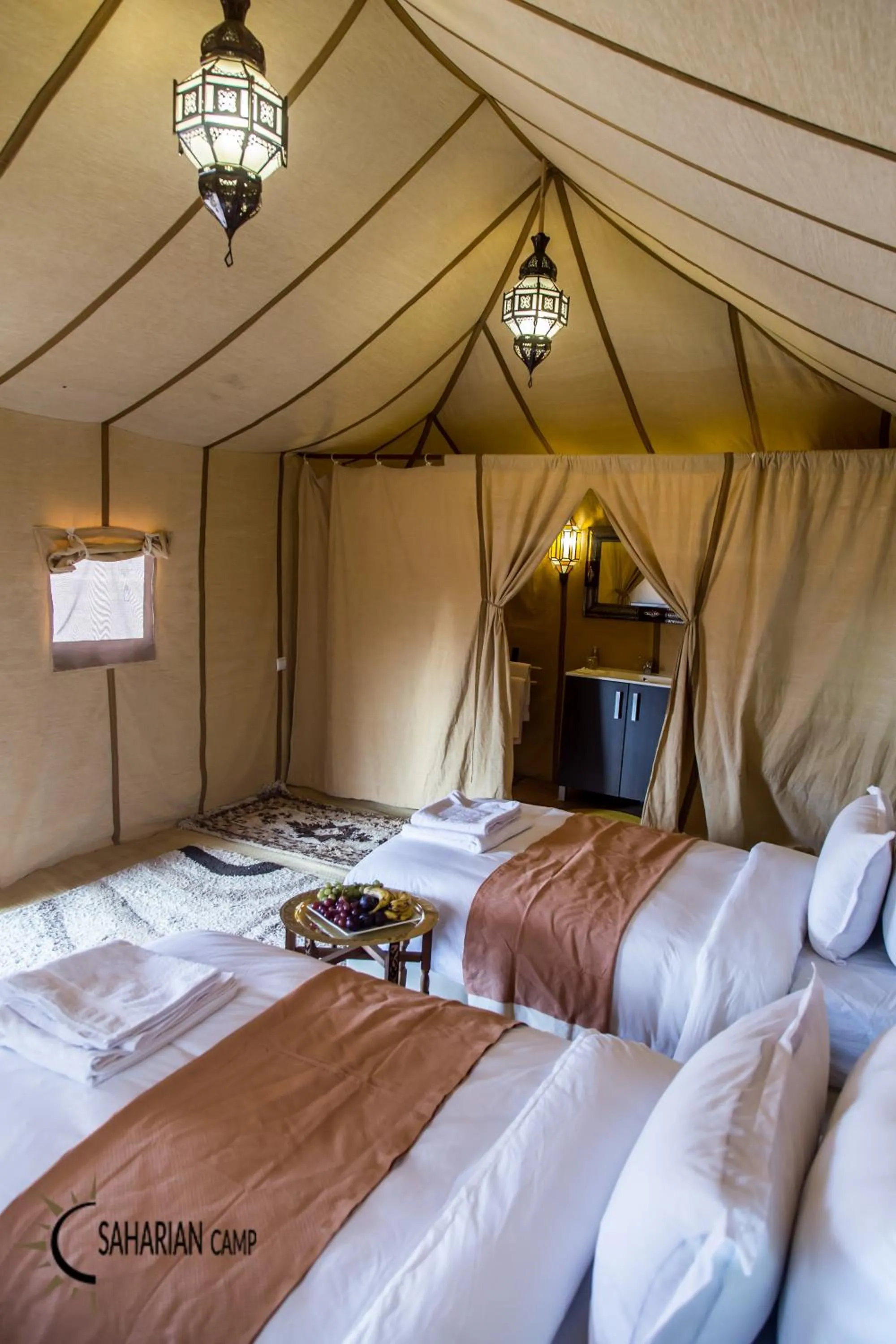 Bed in Merzouga Luxury Camp
