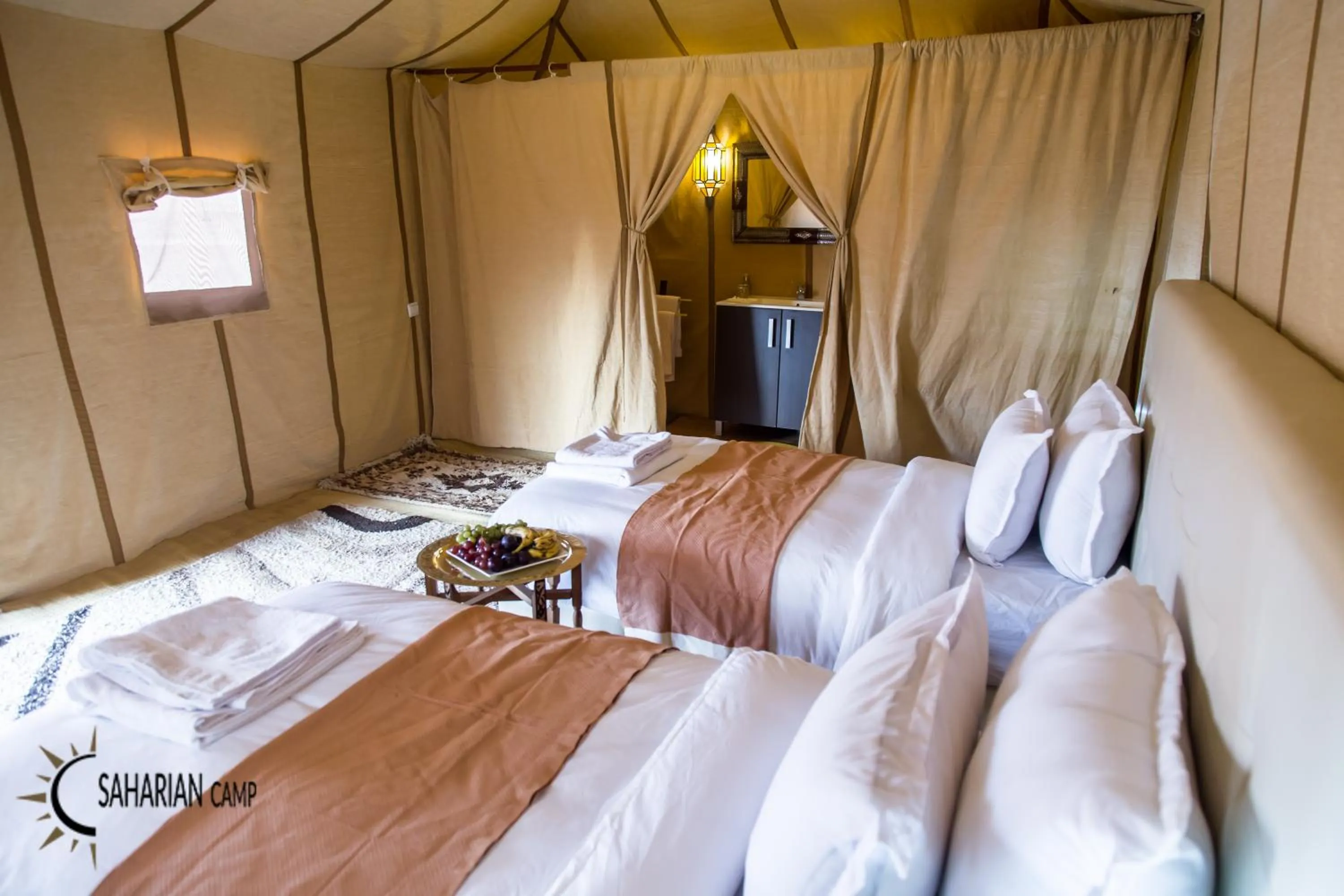 Photo of the whole room, Bed in Merzouga Luxury Camp