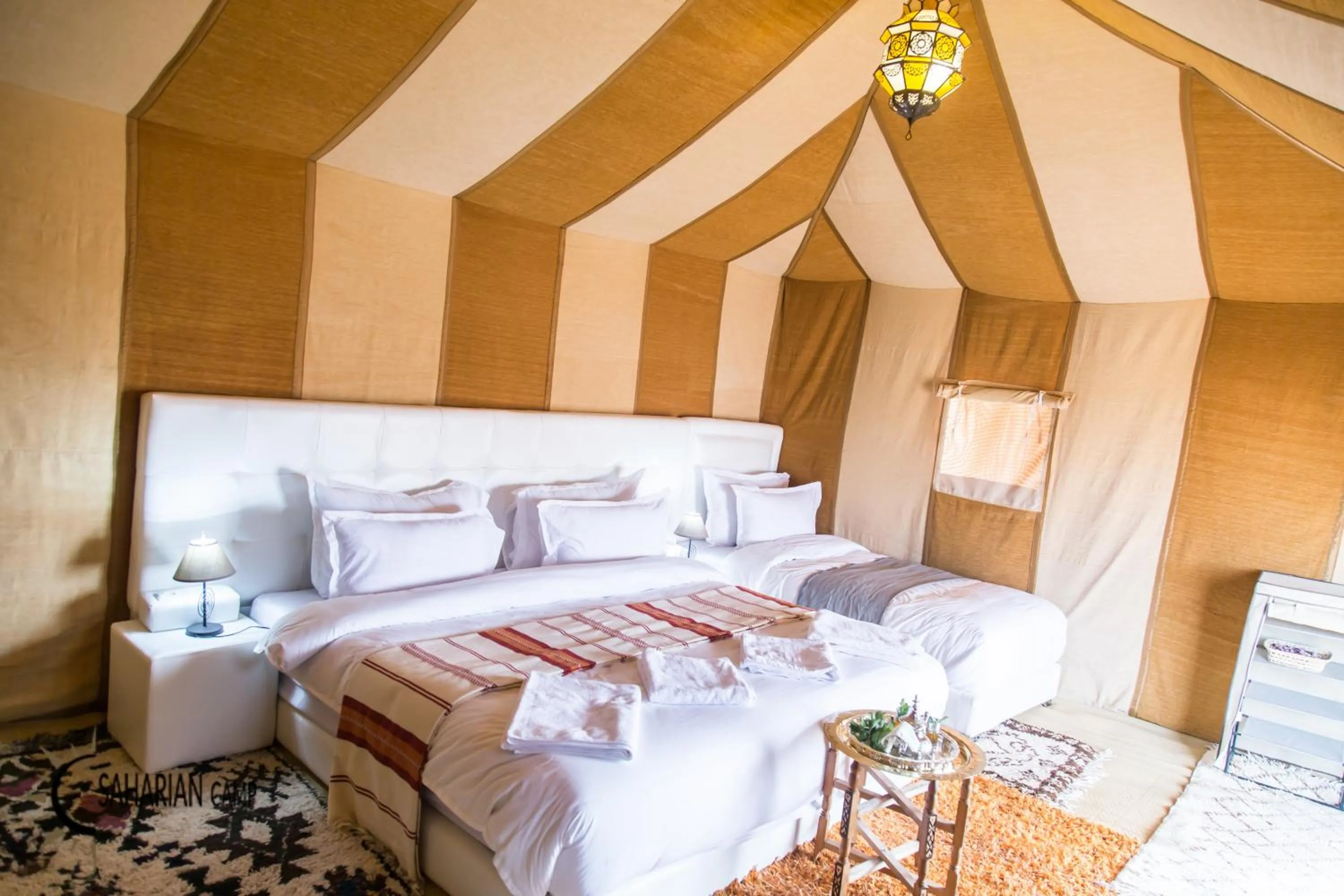 Photo of the whole room, Bed in Merzouga Luxury Camp