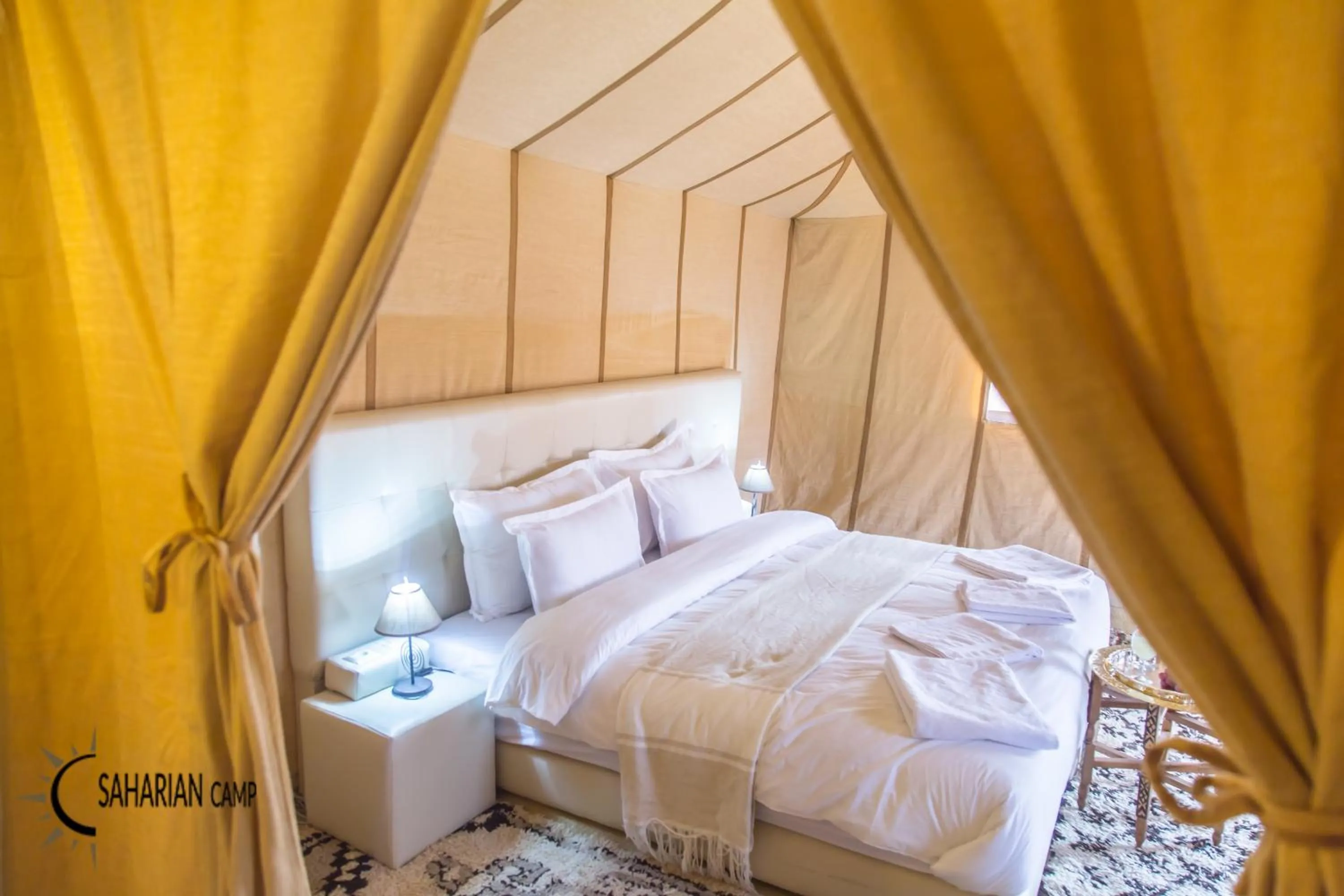Photo of the whole room, Bed in Merzouga Luxury Camp