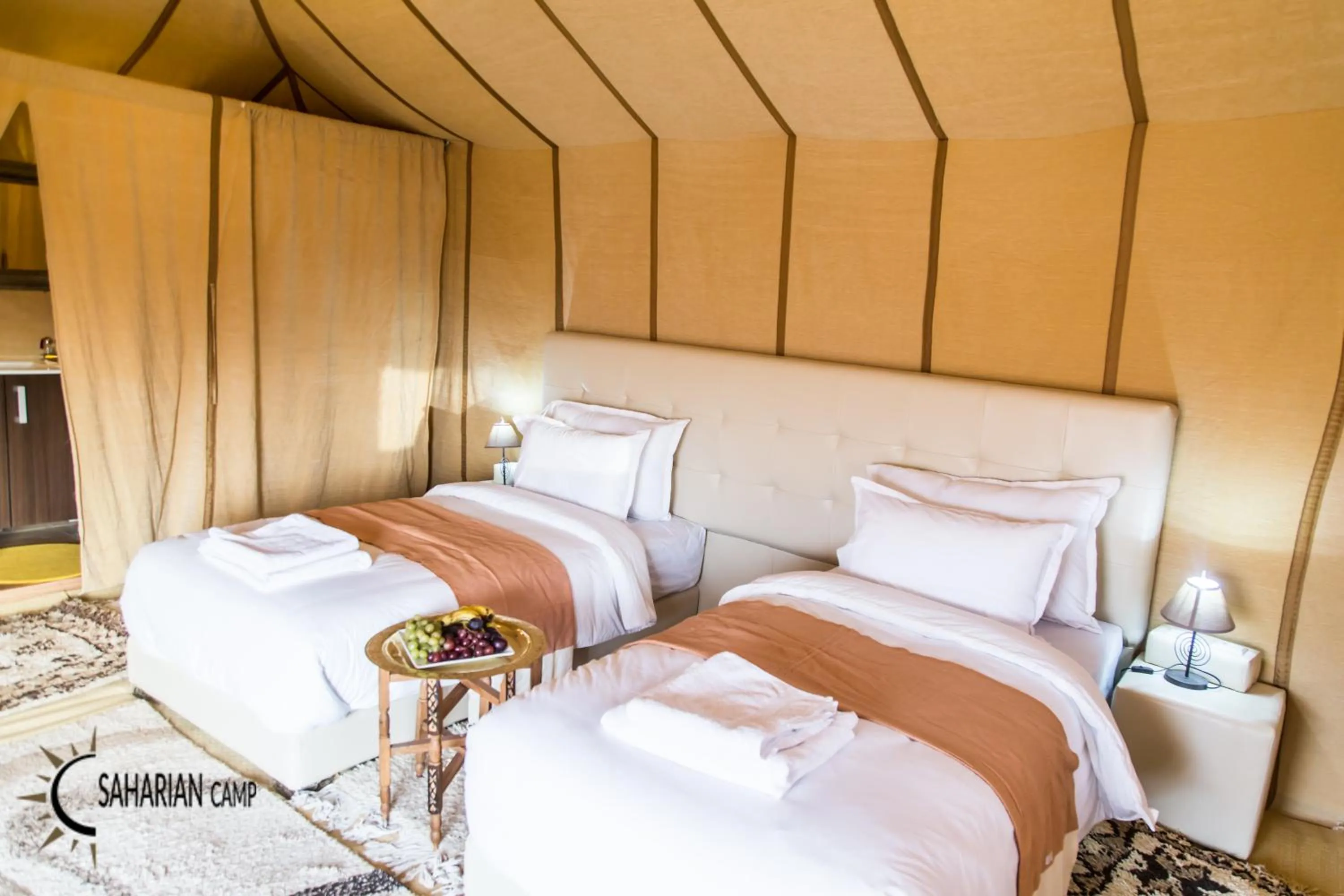 Bed in Merzouga Luxury Camp