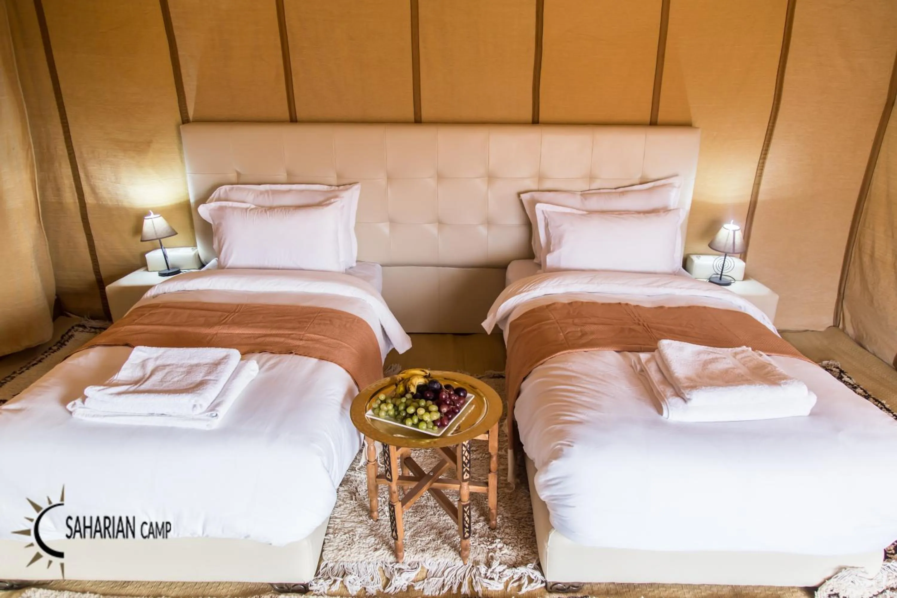 Bed in Merzouga Luxury Camp