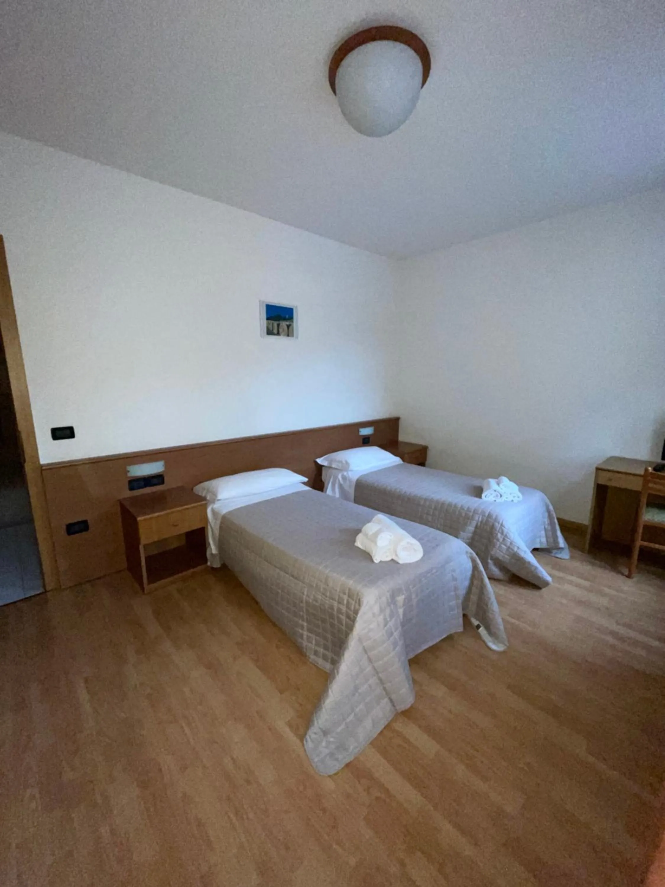 Bed in Hotel Vittoria