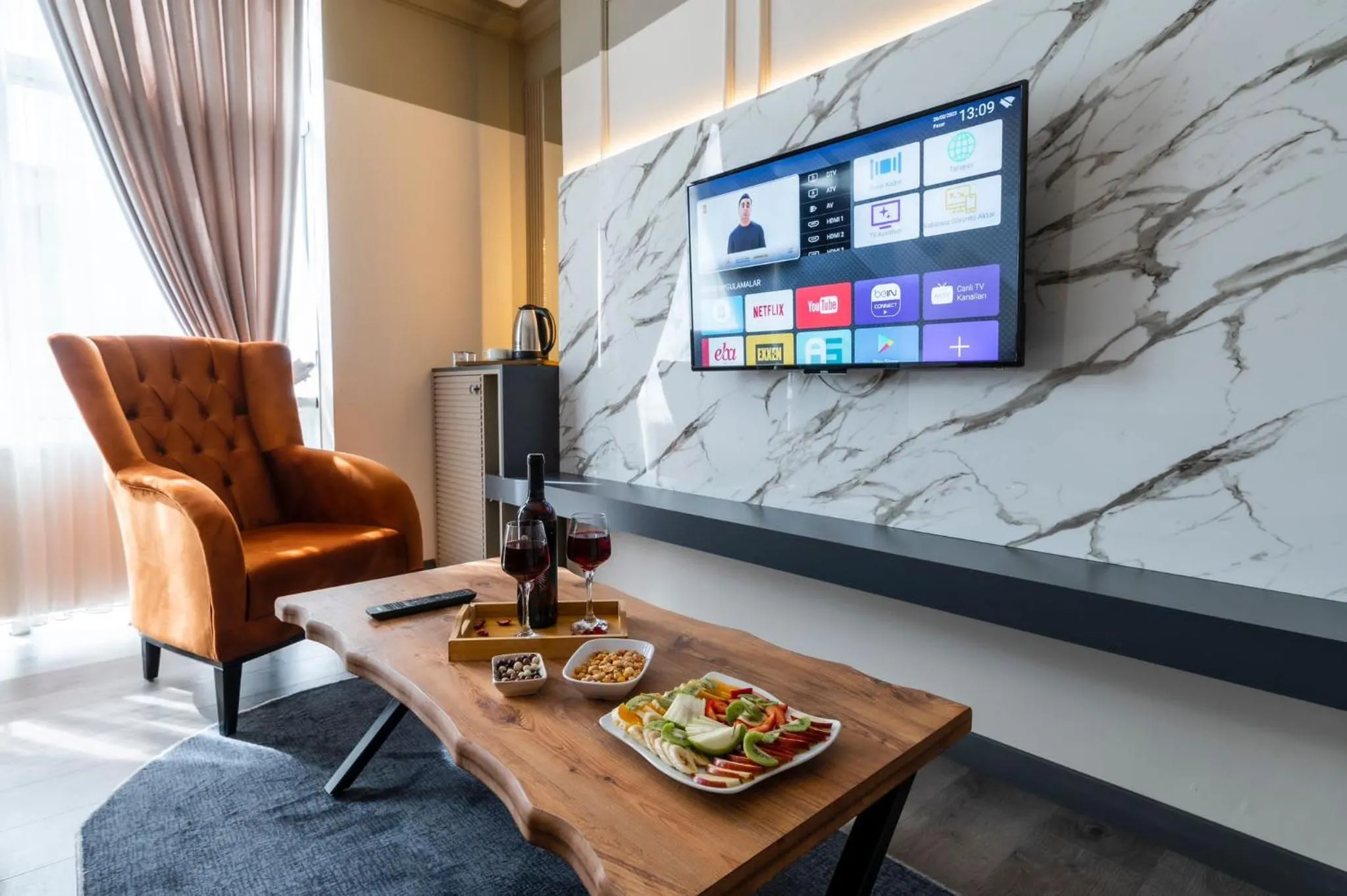 TV and multimedia in Kral As Suite Hotel