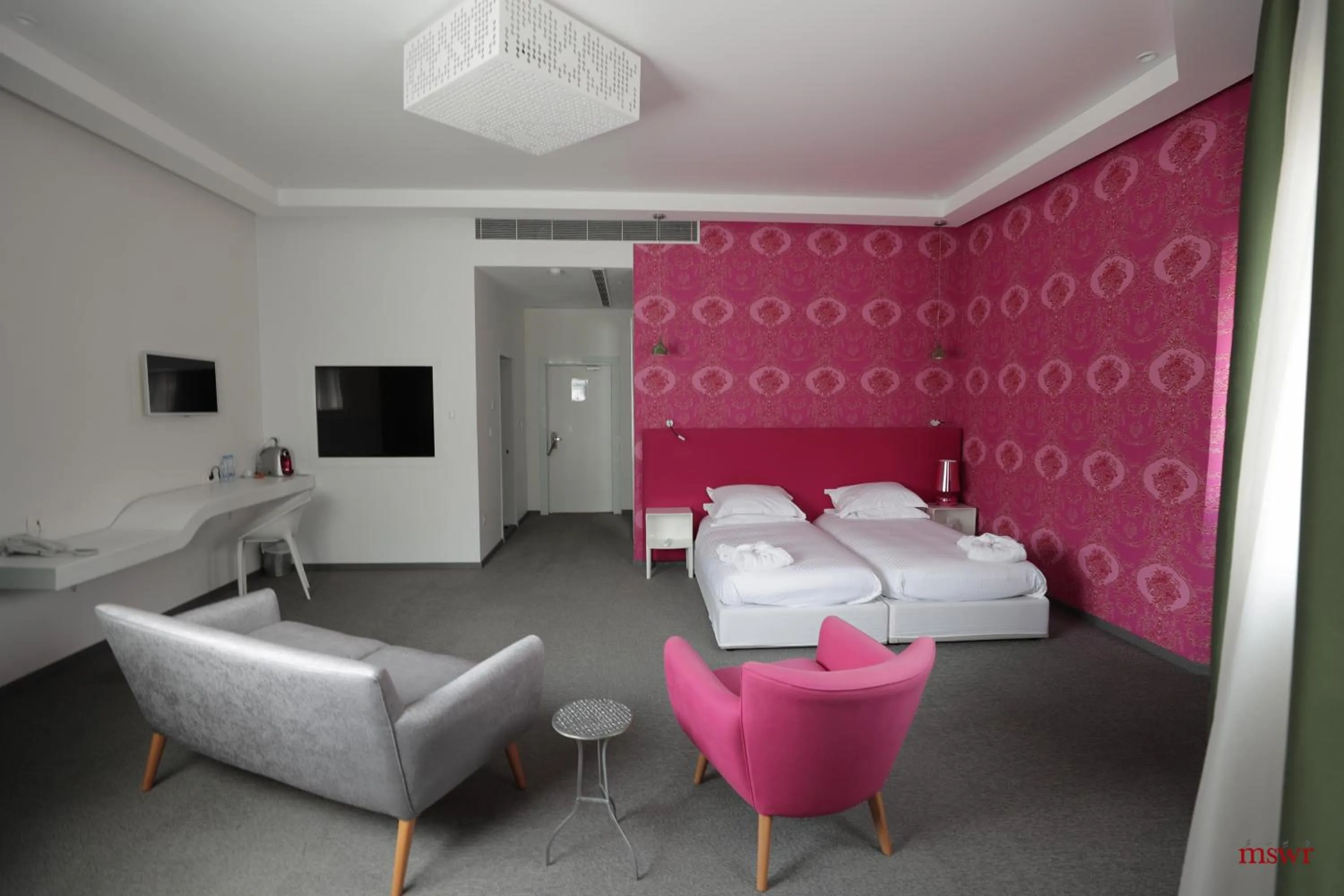 Living room, Bed in Miramar Hotel Resort and Spa