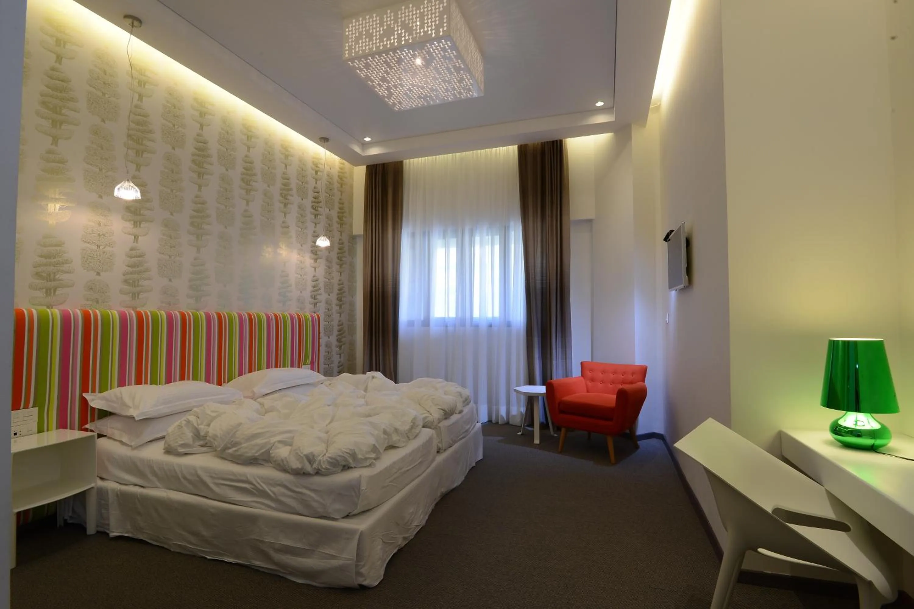 Bed in Miramar Hotel Resort and Spa