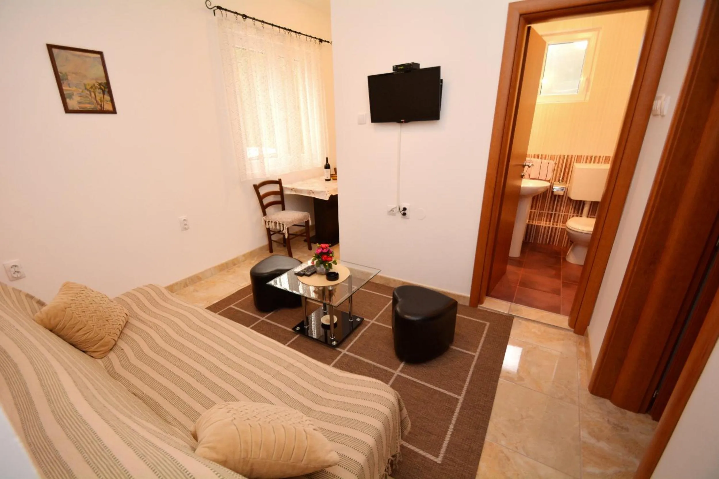 Living room, Bed in Marinero Apartments