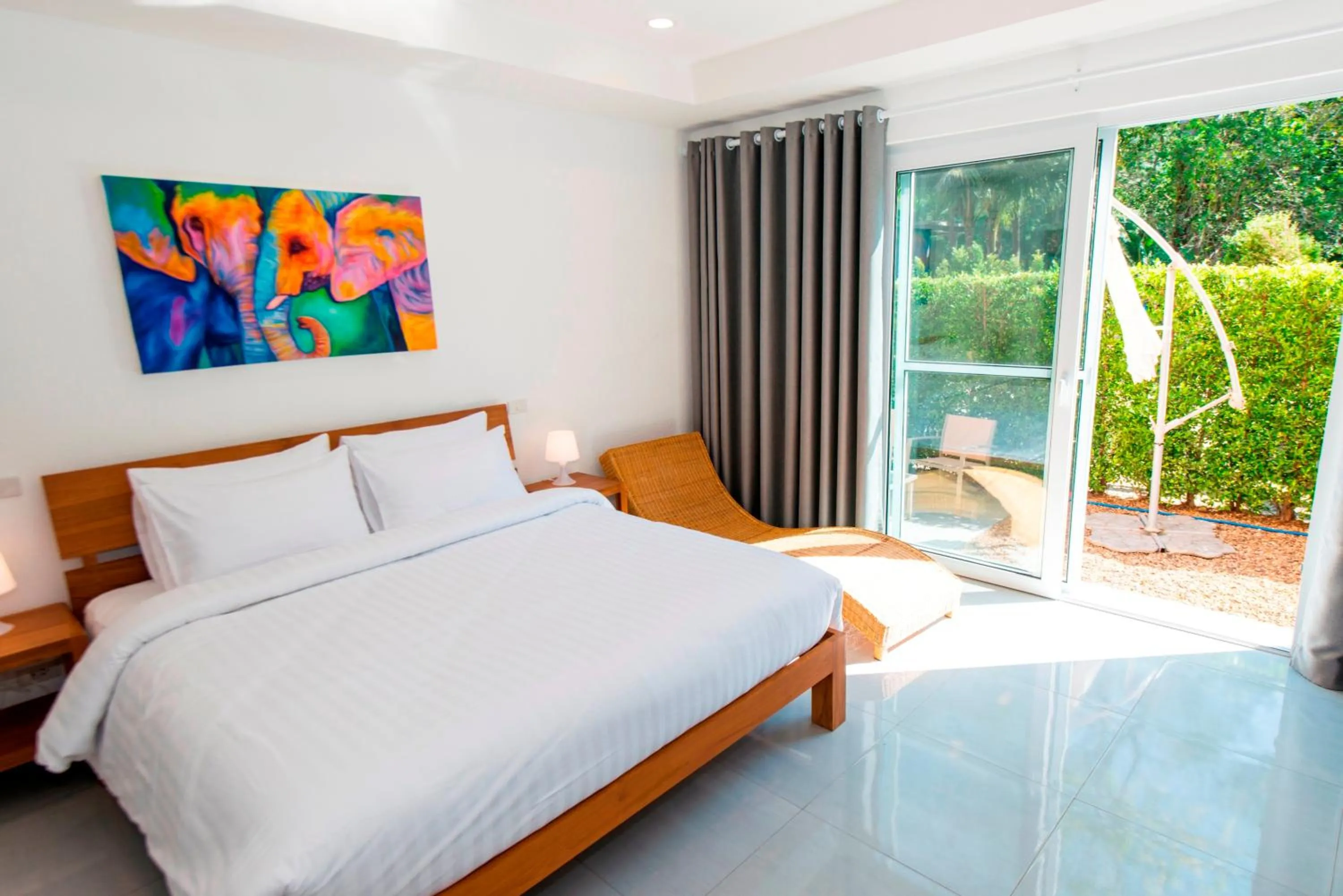 Bed in Sunset Emily Villas & Rooms