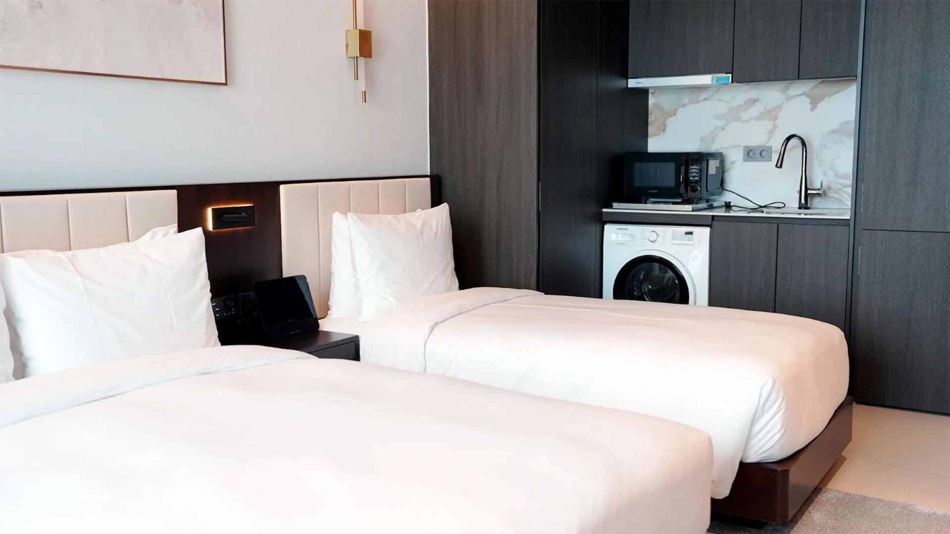 Bed in WAVEM HOTEL East