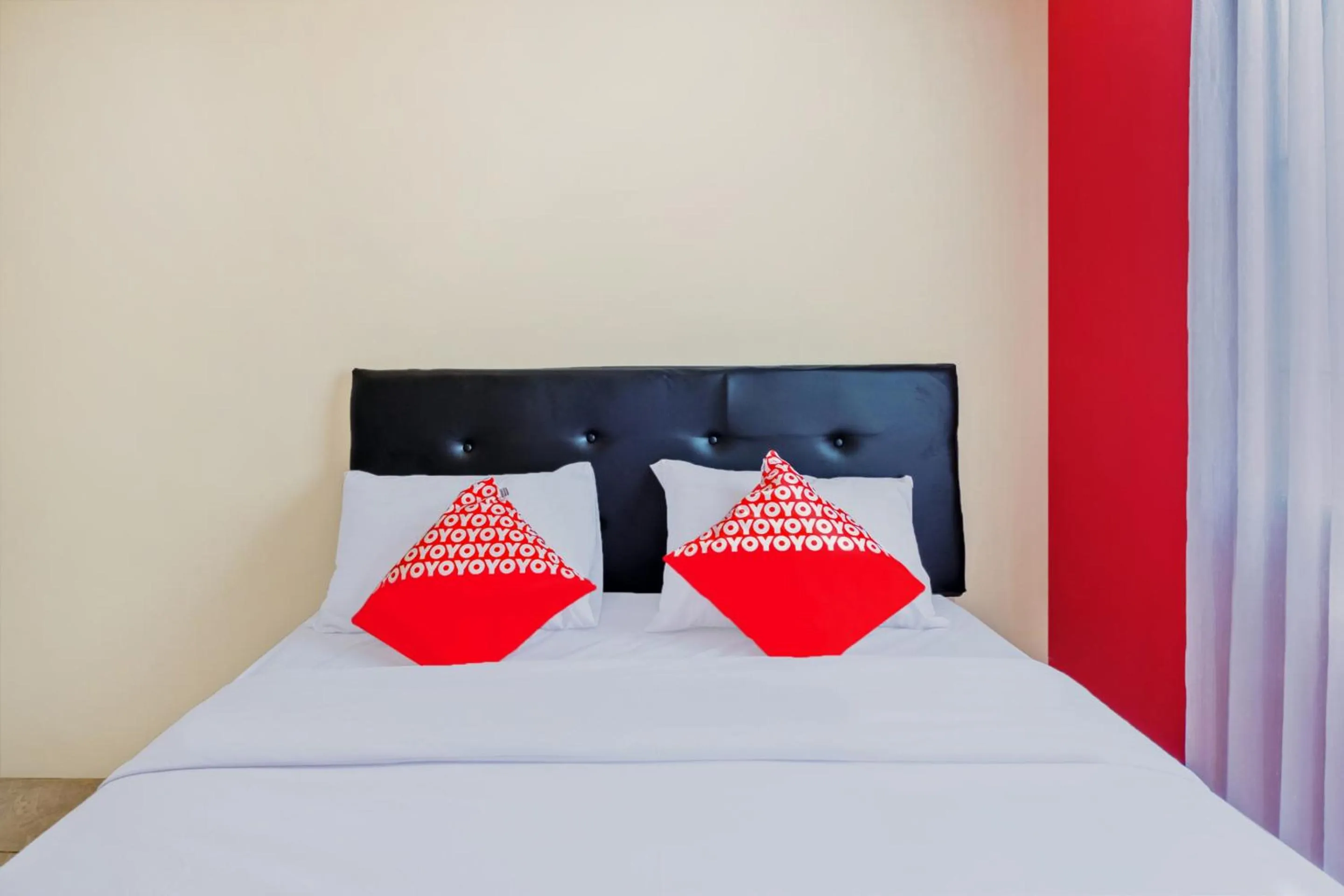 Bedroom in Hotel O Sudirman Guesthouse Syariah