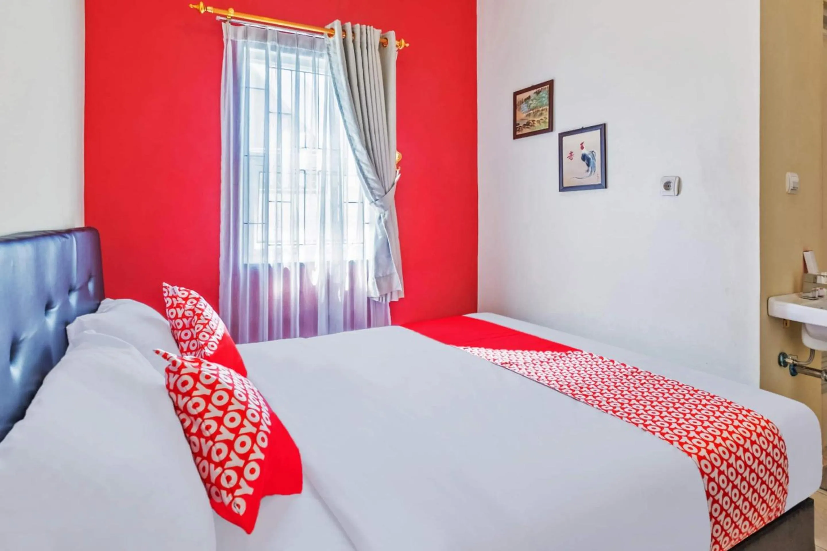 Bedroom in Hotel O Sudirman Guesthouse Syariah