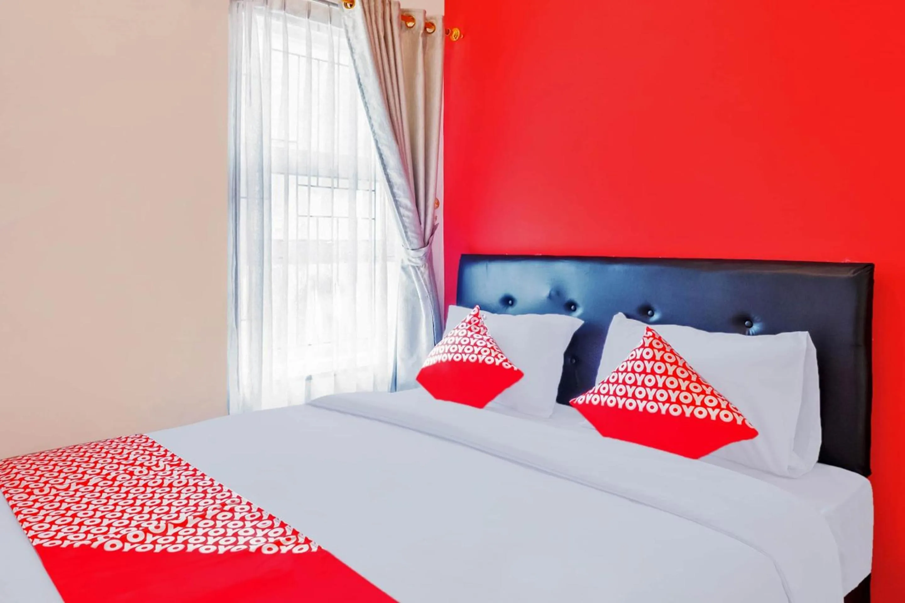 Bedroom in Hotel O Sudirman Guesthouse Syariah