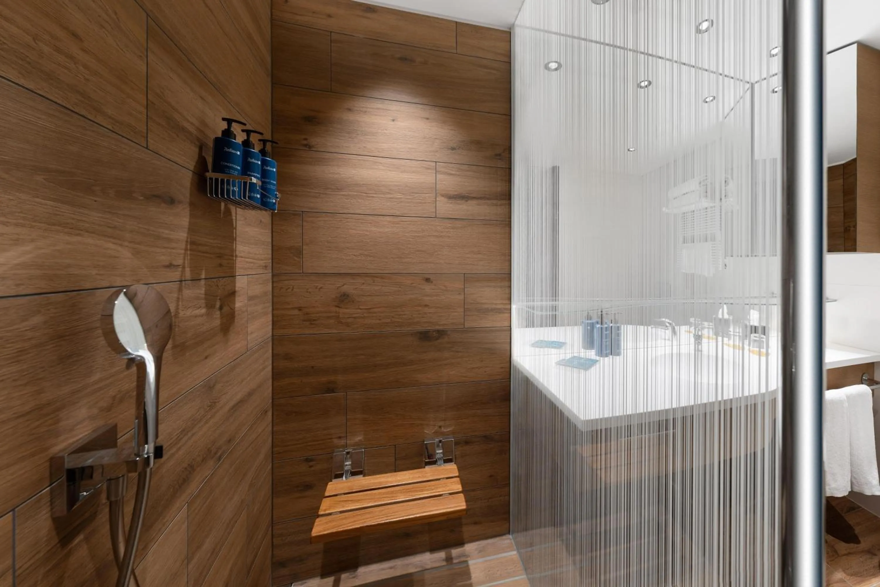 Bathroom in Radisson Blu Hotel, Bergamo ChorusLife