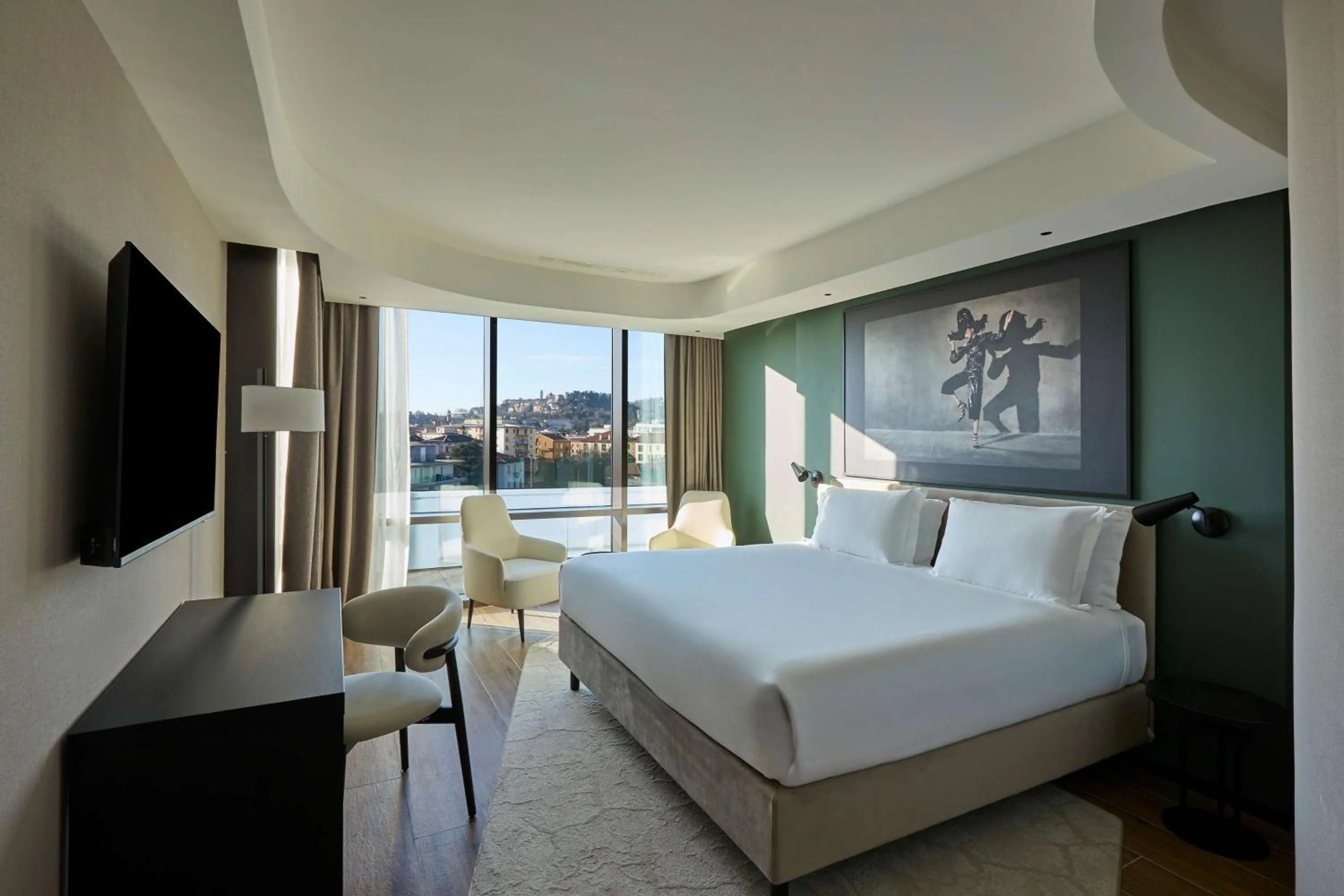 Photo of the whole room, Bed in Radisson Blu Hotel, Bergamo ChorusLife