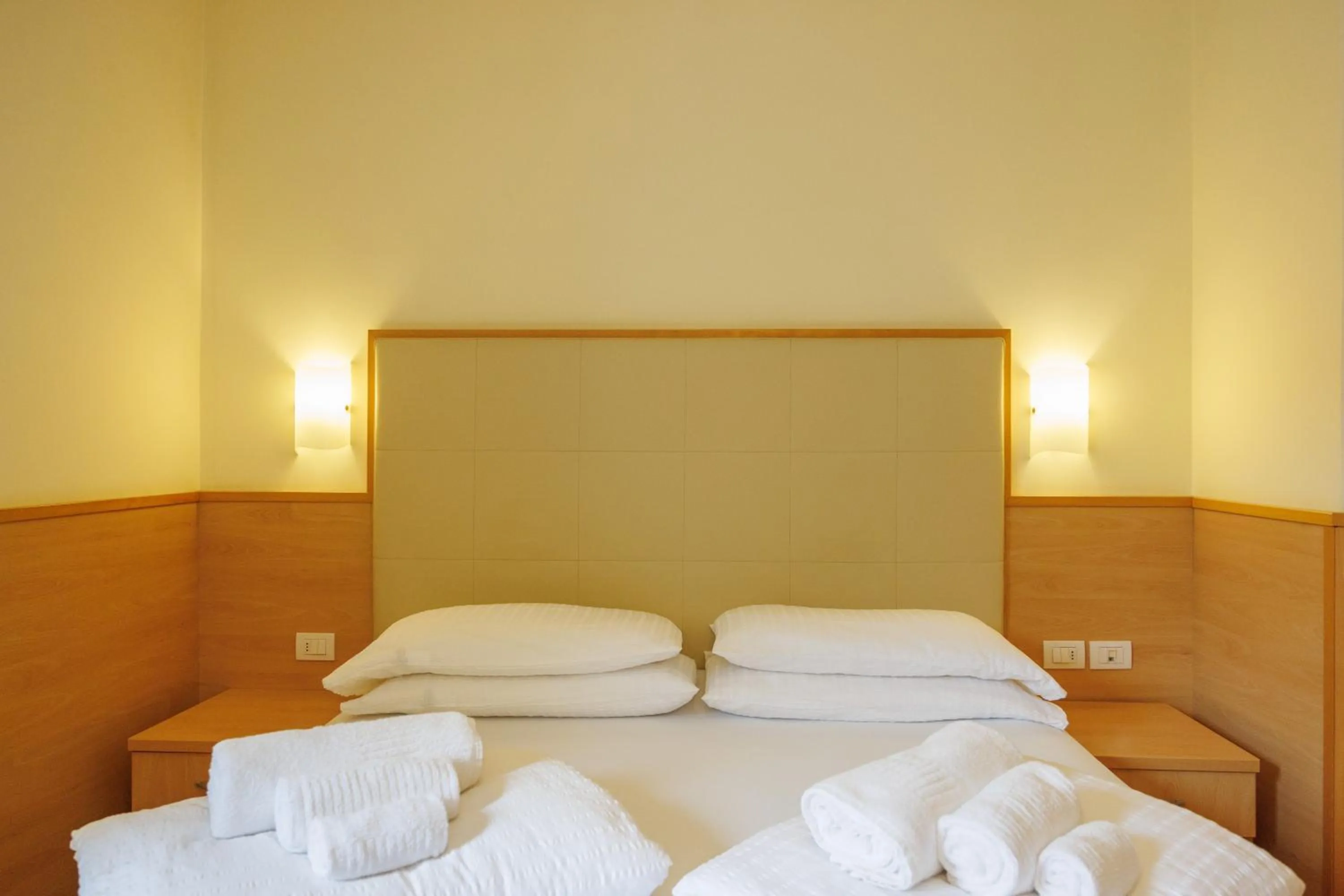 Bed in Club Hotel e Residence La Vela