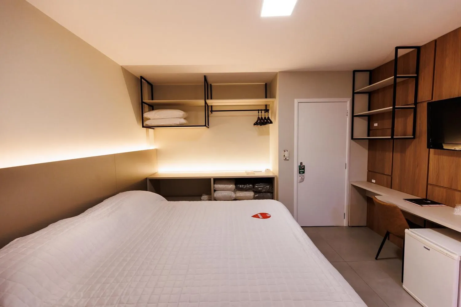 Bed in Tonello Business Hotel