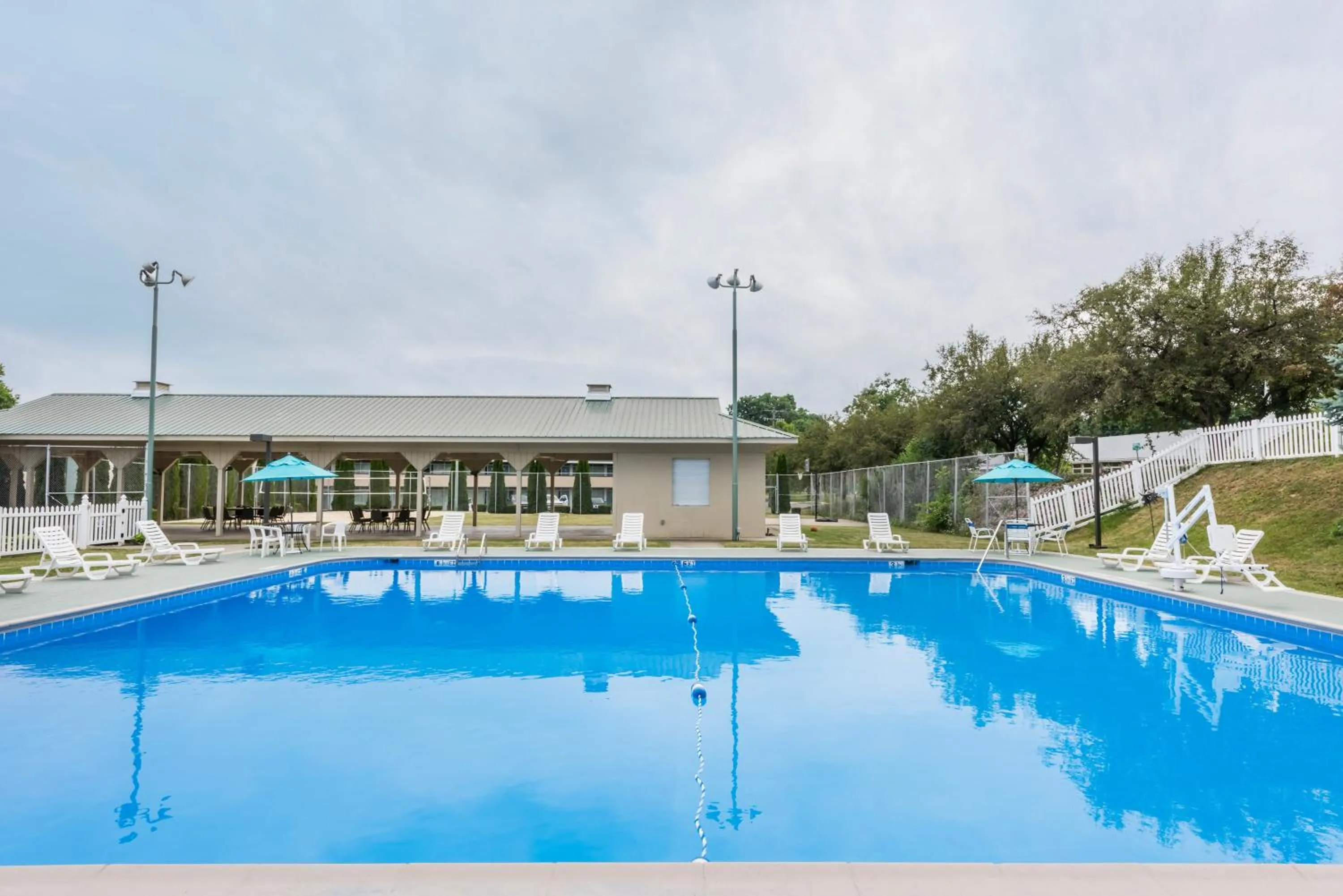Swimming pool in Ramada by Wyndham State College Hotel & Conference Center