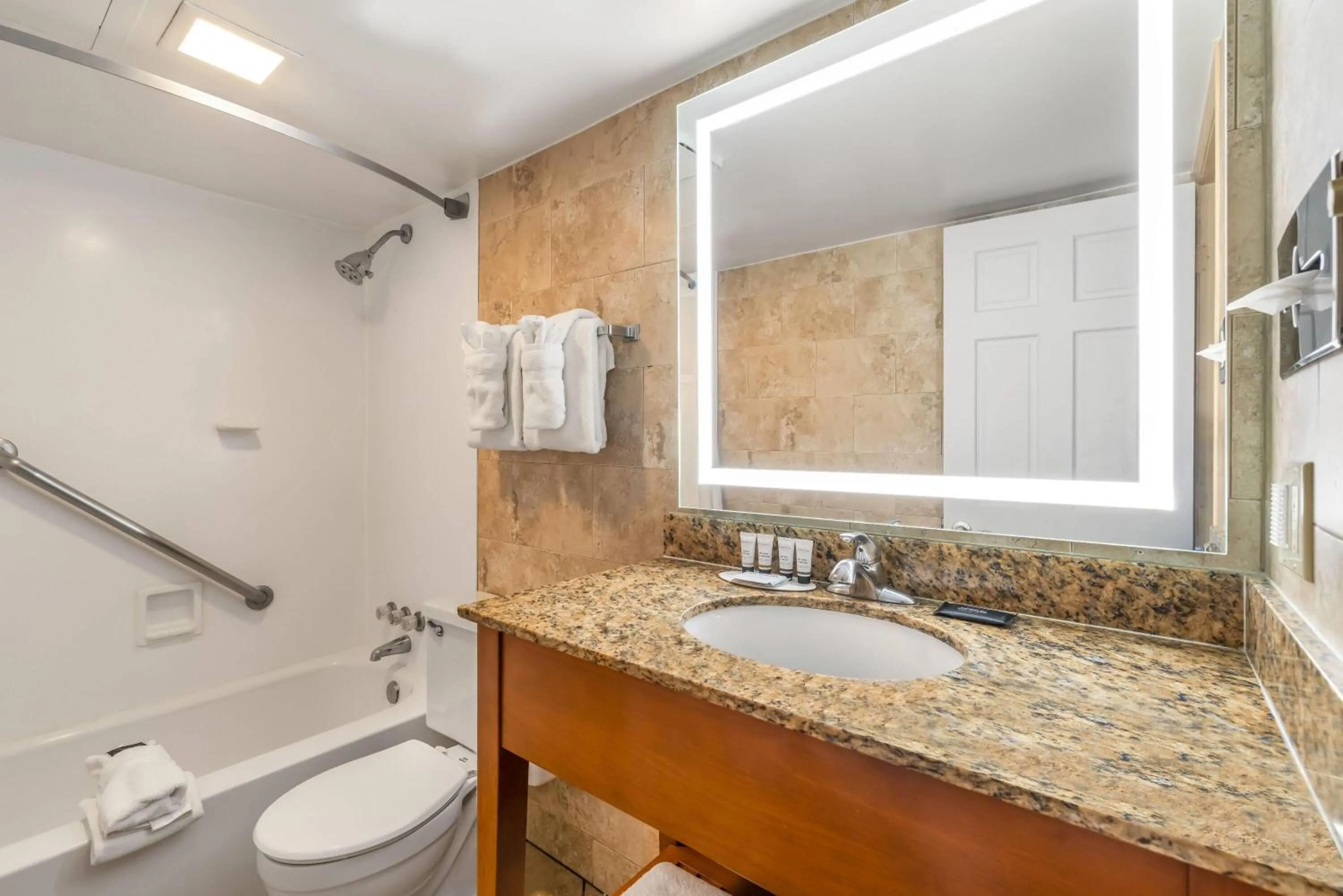 Bathroom in Ramada by Wyndham State College Hotel & Conference Center