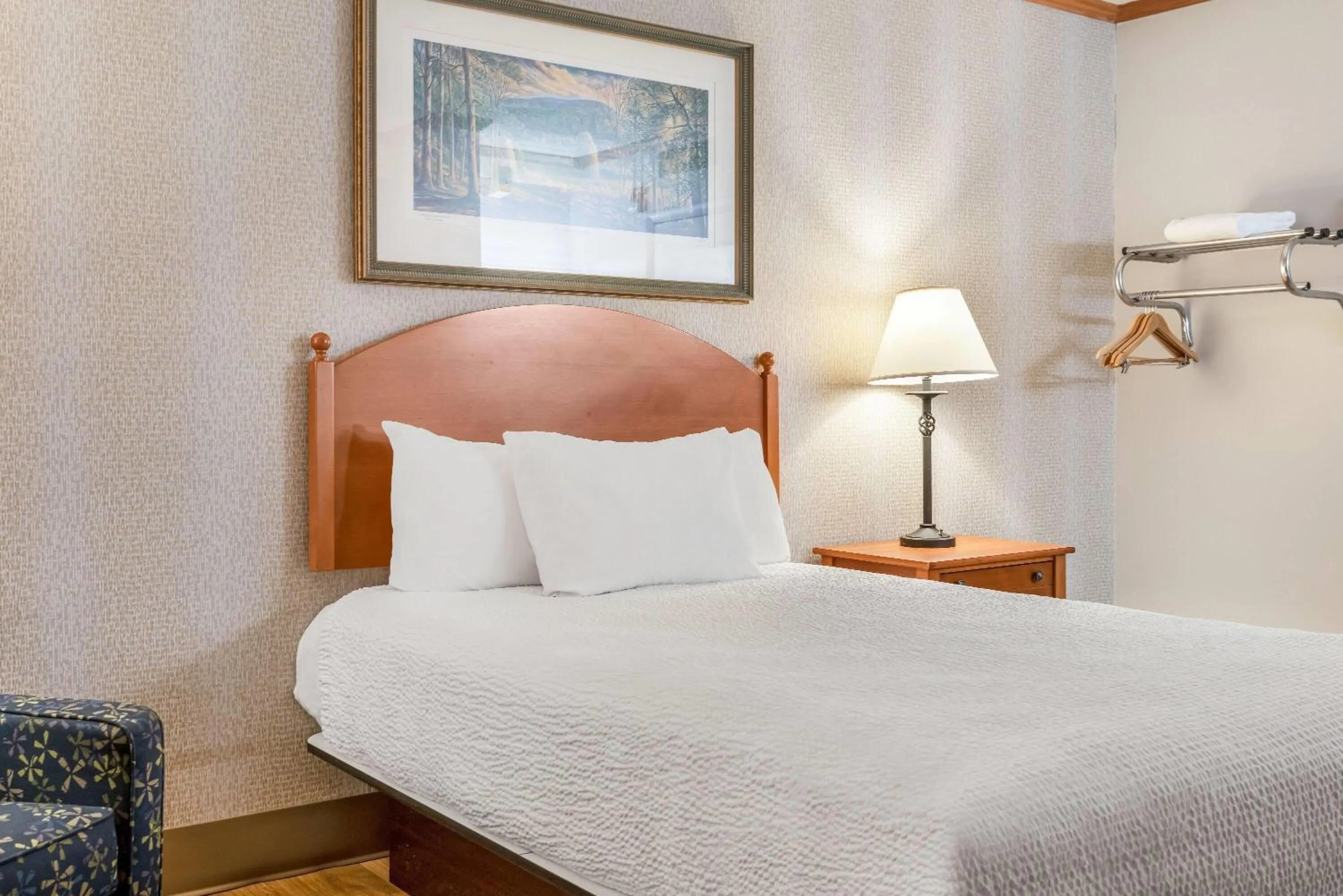 Bed in Ramada by Wyndham State College Hotel & Conference Center