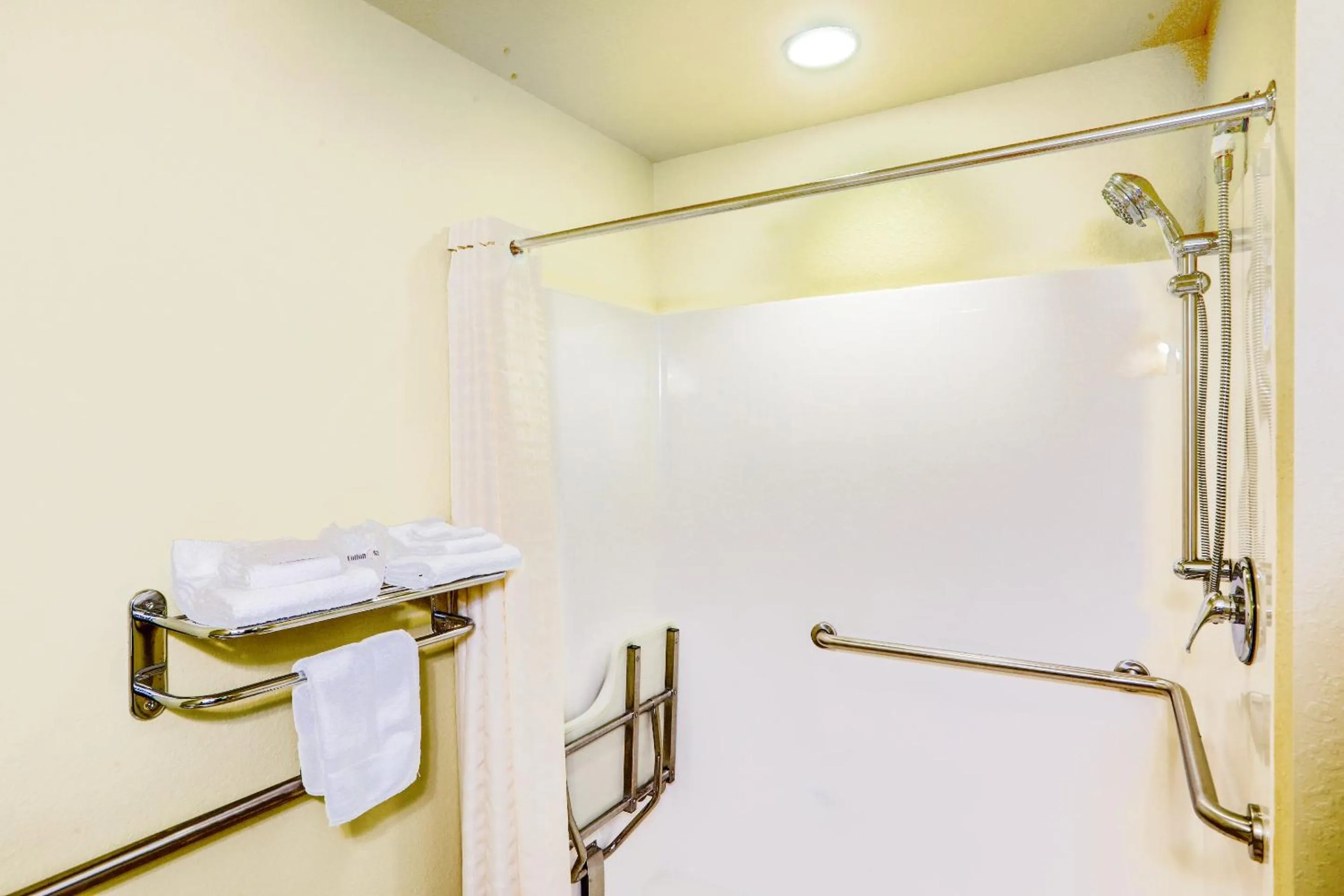 Bathroom in Evansville Inn & Suites by OYO