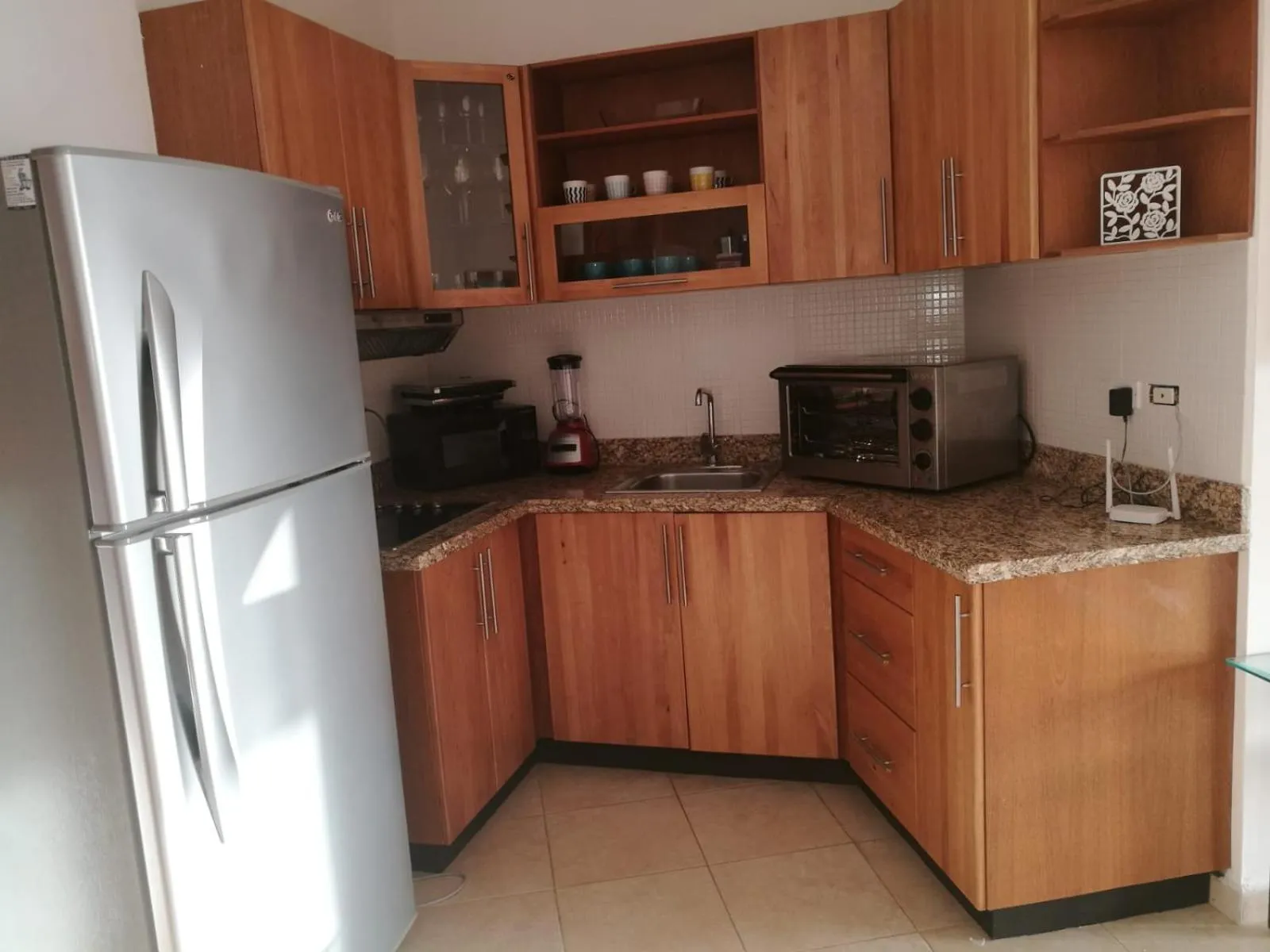 Kitchen or kitchenette in Los Flamencos Aparthotel Beach Club