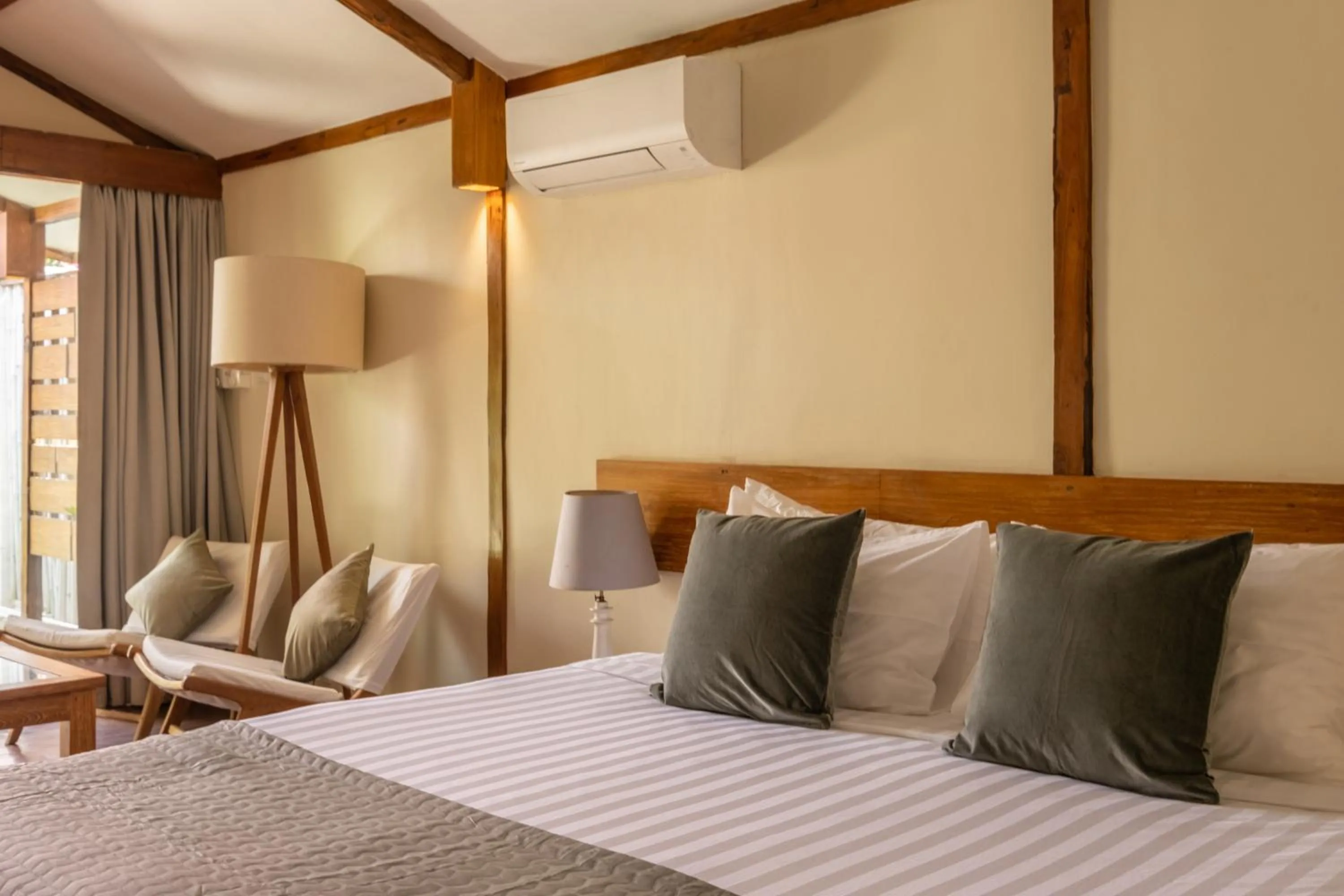 Bed in Gili Teak Beach Front Resort