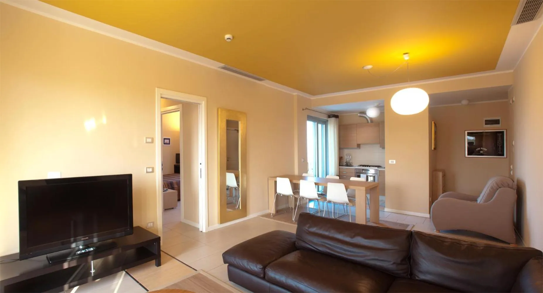 Kitchen or kitchenette in Aparthotel La Pineta