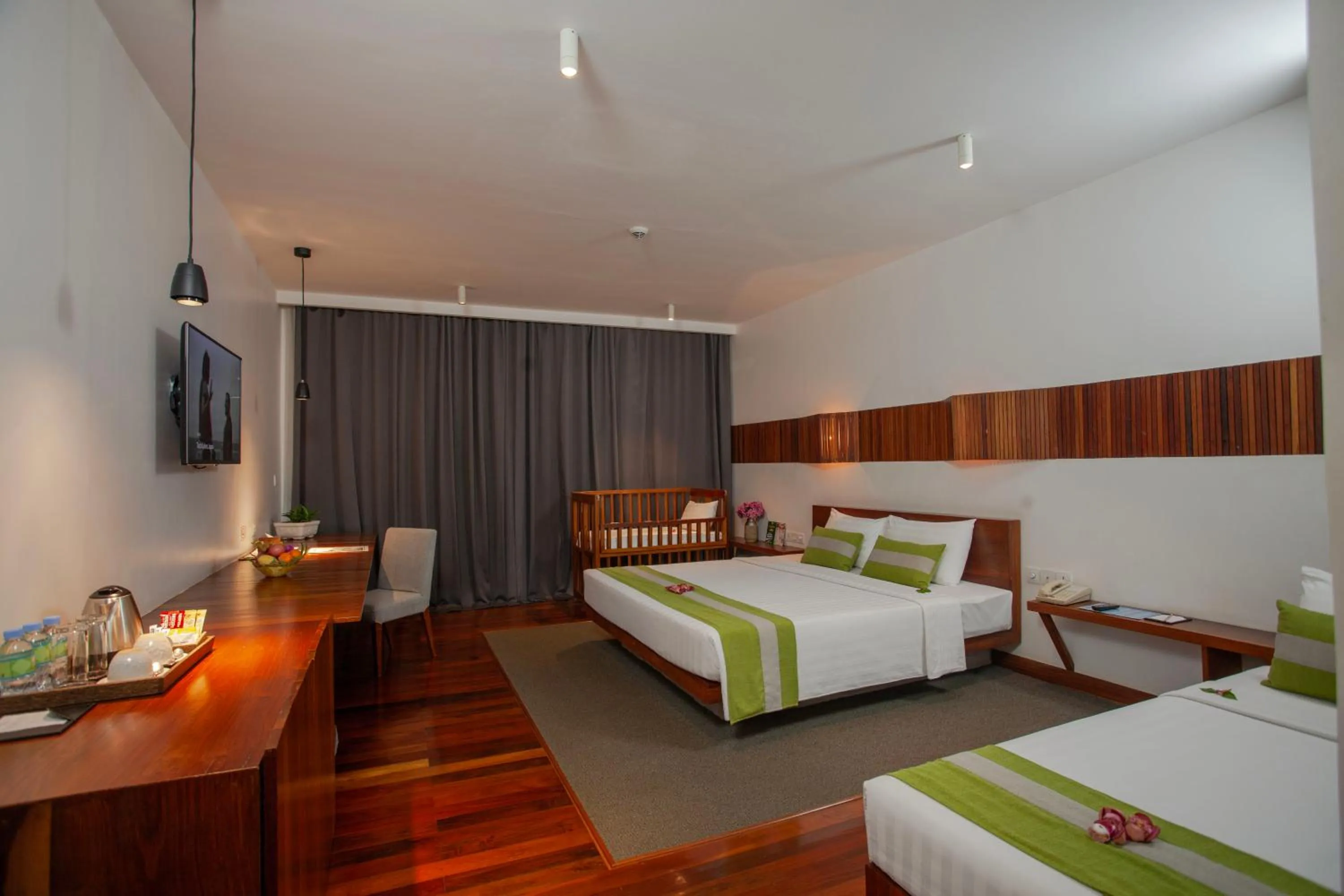 Bed in Hotel Somadevi Angkor Boutique and Resort