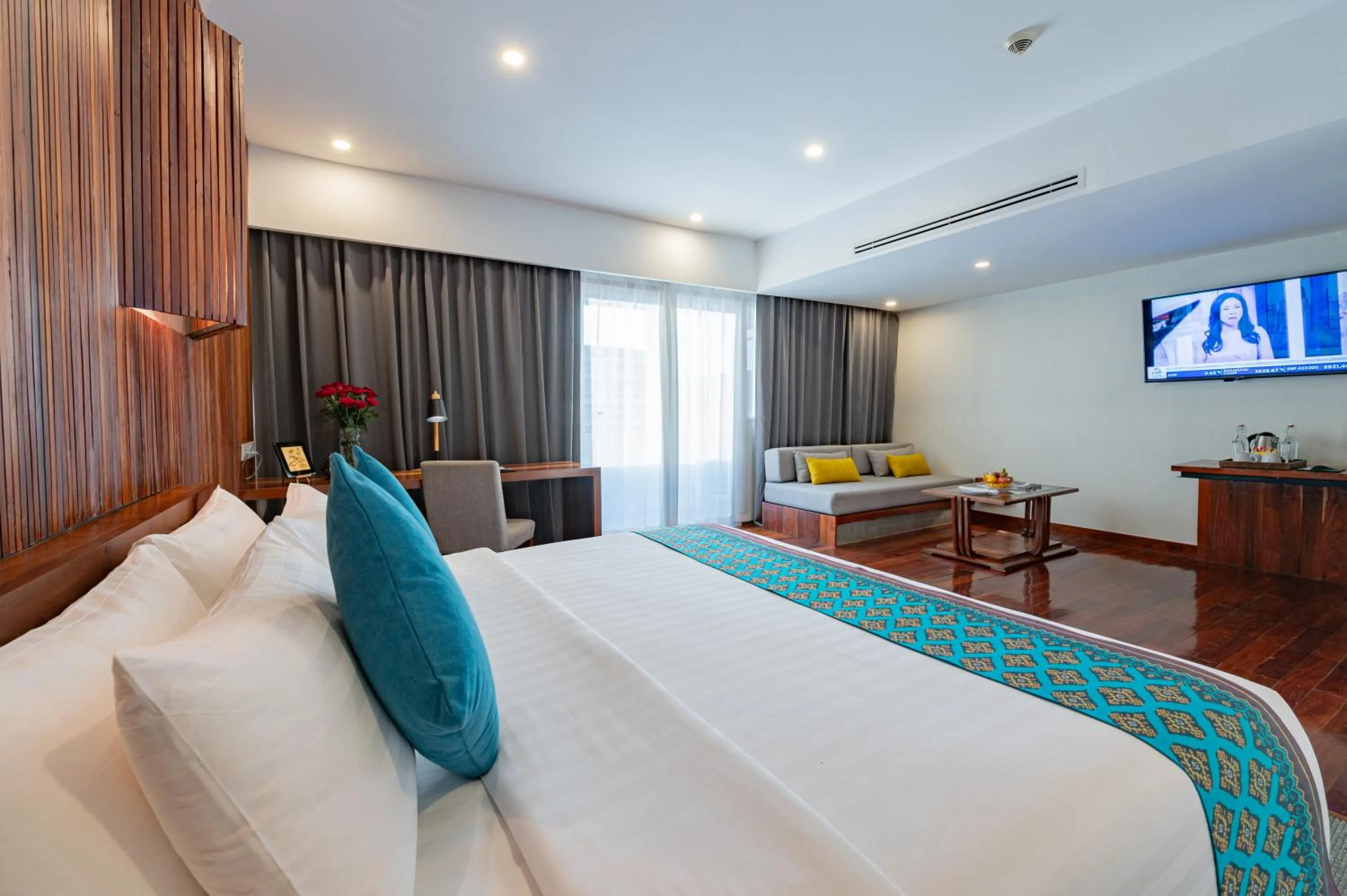 Bed in Hotel Somadevi Angkor Boutique and Resort