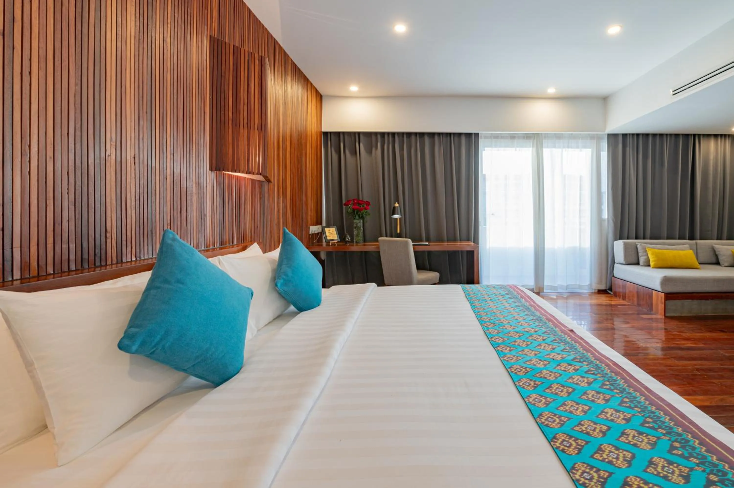 Bed in Hotel Somadevi Angkor Boutique and Resort