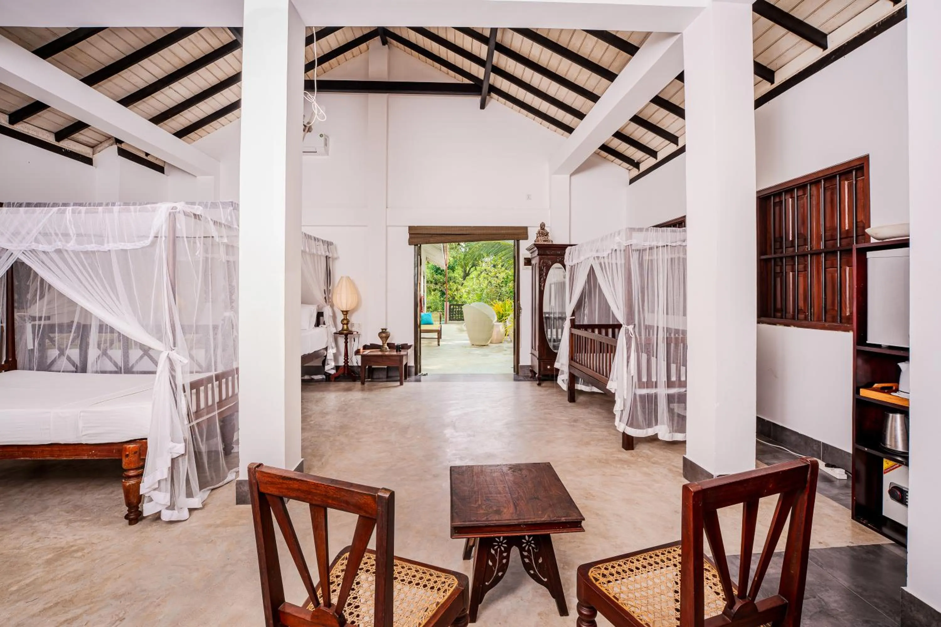 Patio, Bed in Wasantha Garden Hotel Restaurant & Ayurvedic Treatment