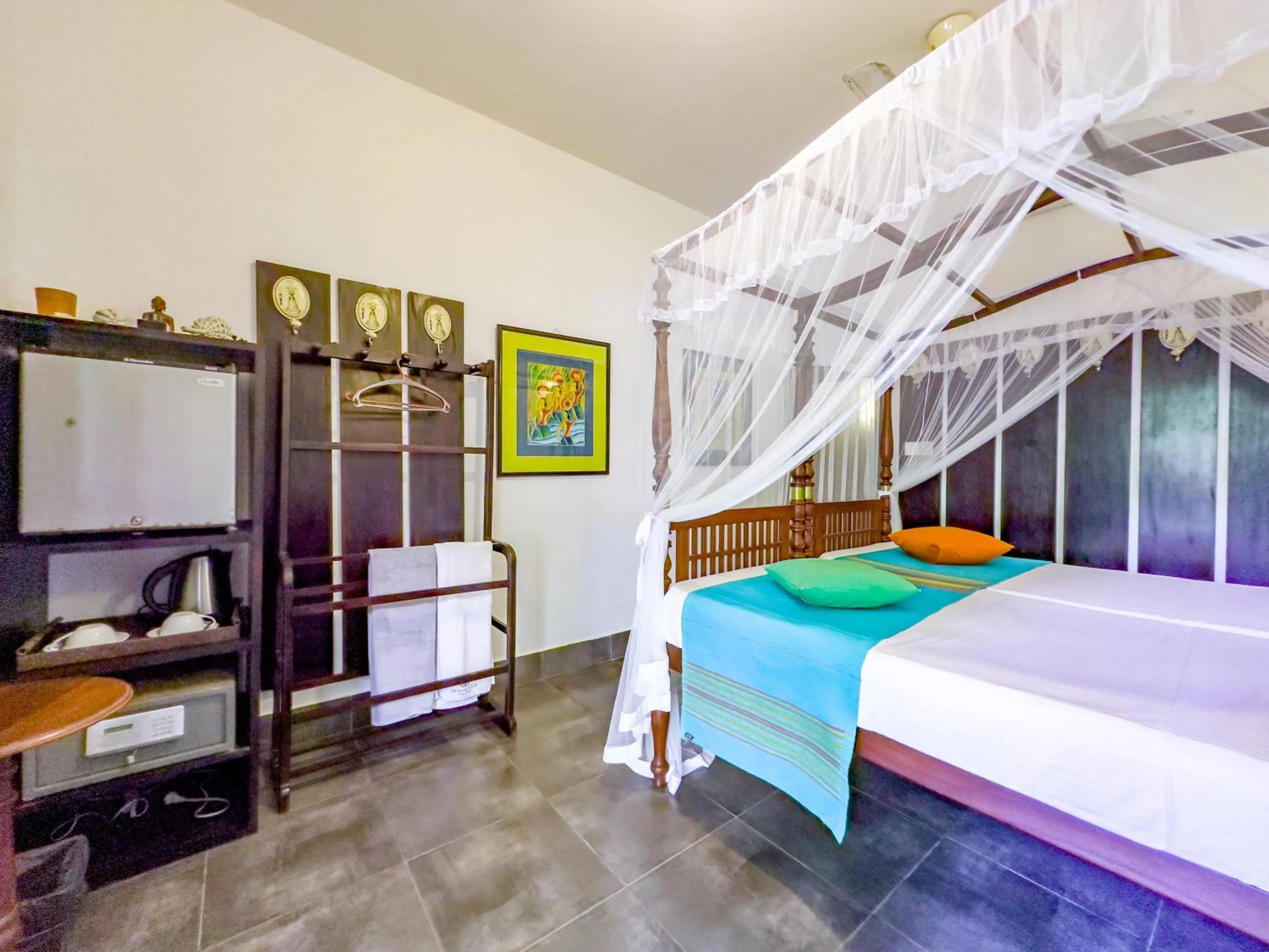 Bed in Wasantha Garden Hotel Restaurant & Ayurvedic Treatment