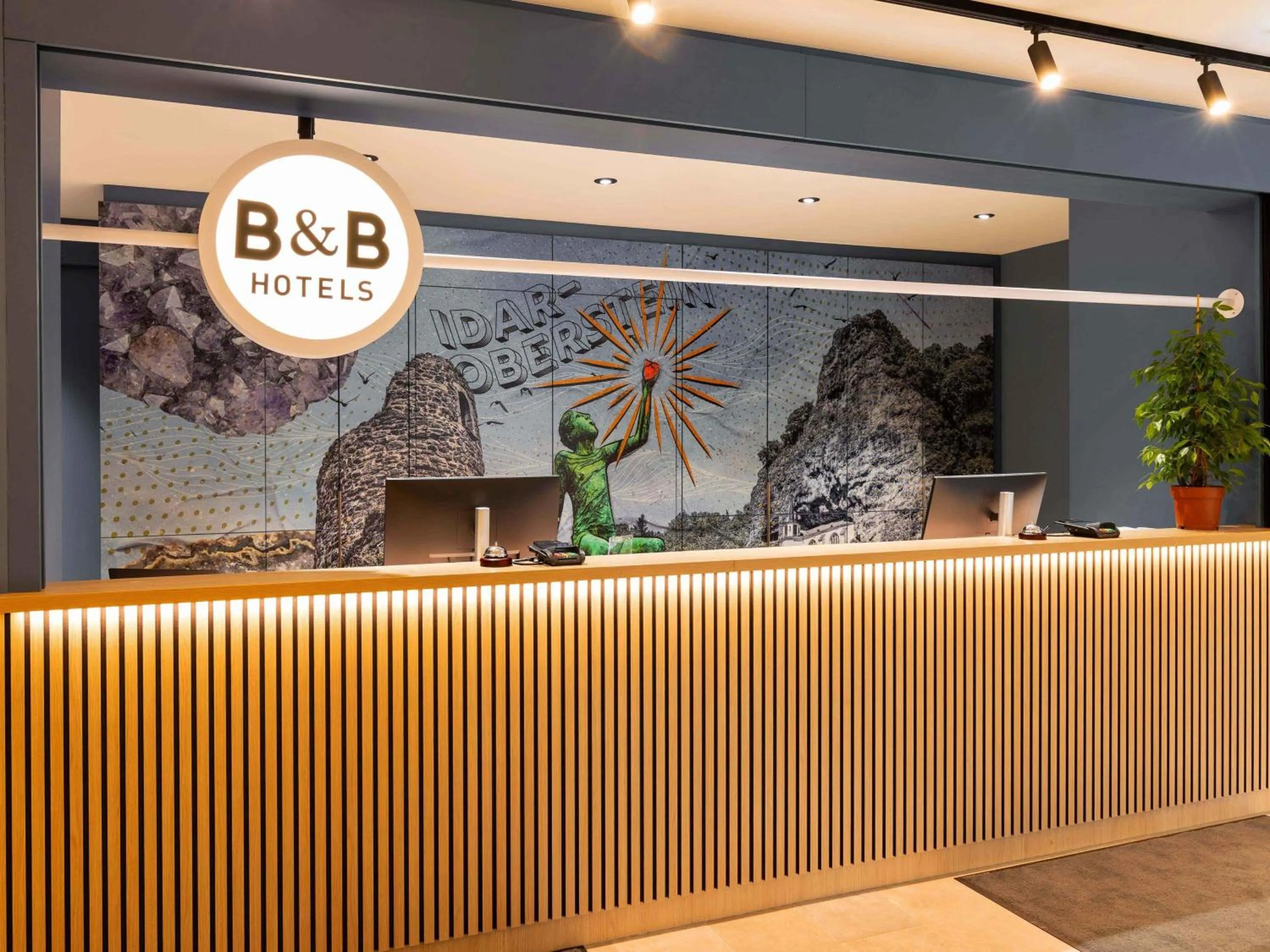 Lobby or reception in B&B HOTEL Idar-Oberstein