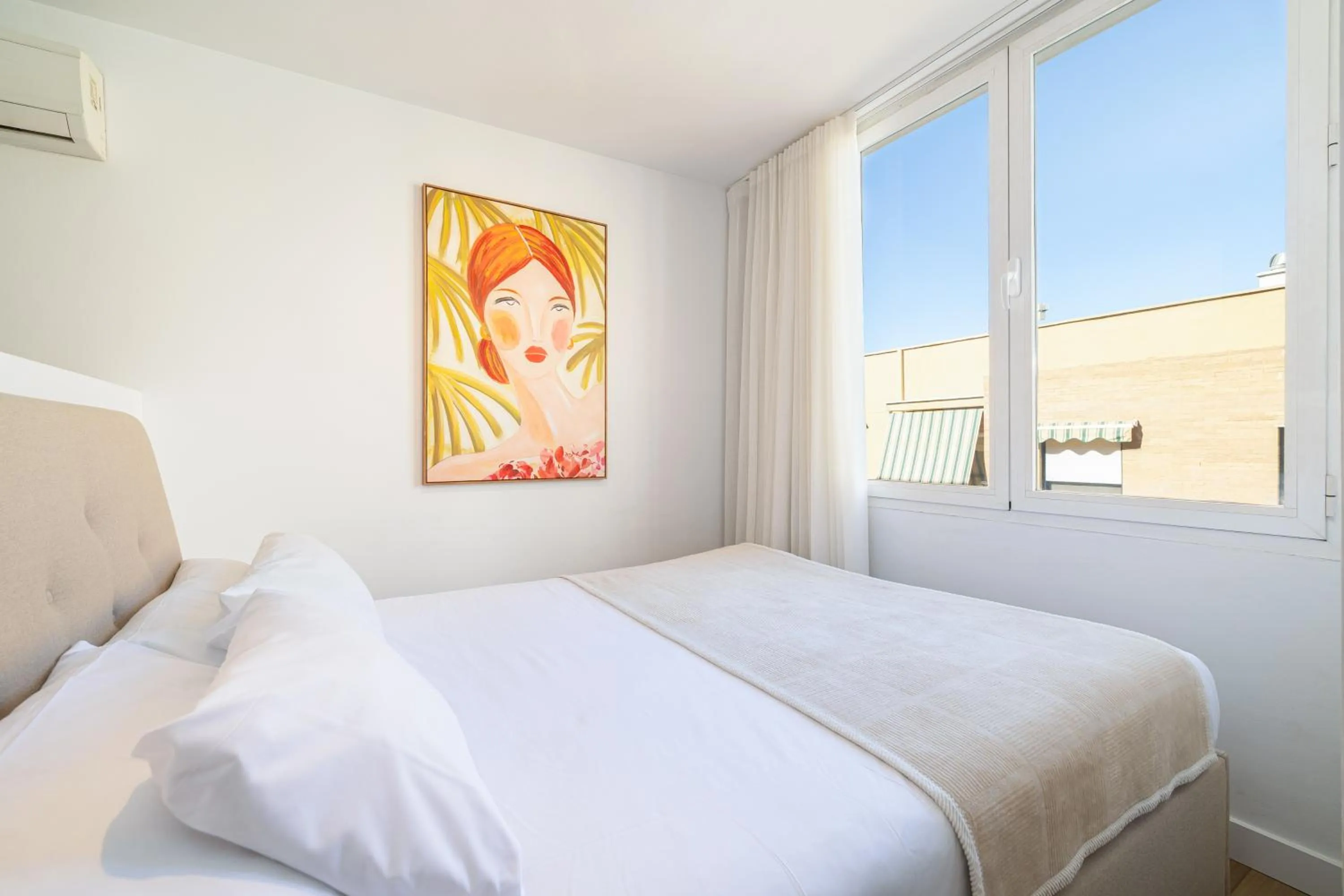 Bed in Holidays2Malaga Studios Juan de Mena