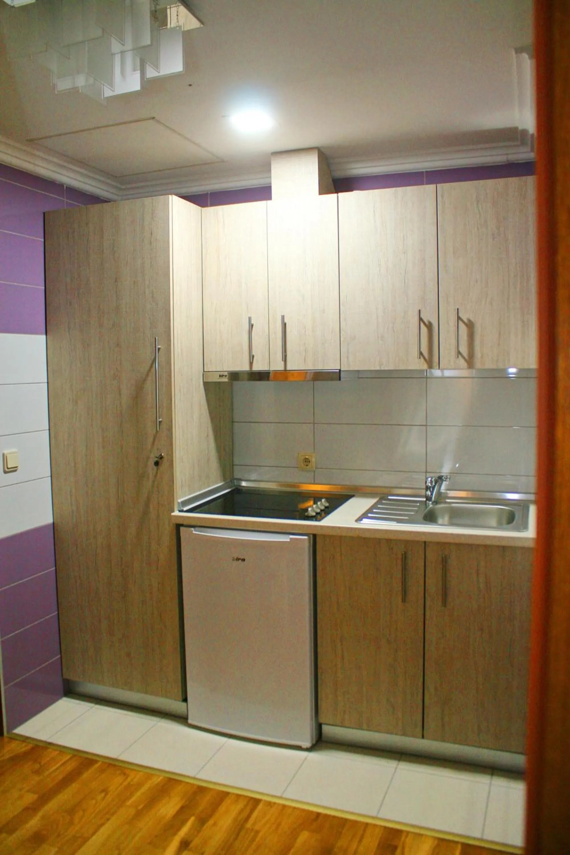 Kitchen or kitchenette in Hotel Elegance