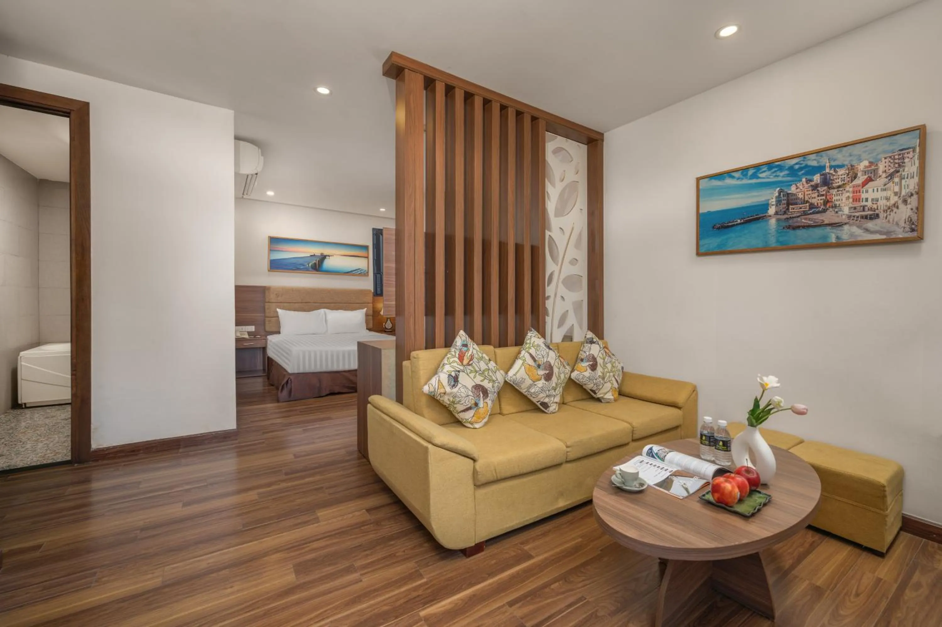 Seating area, Bed in Platinum Orchid Hotel Danang