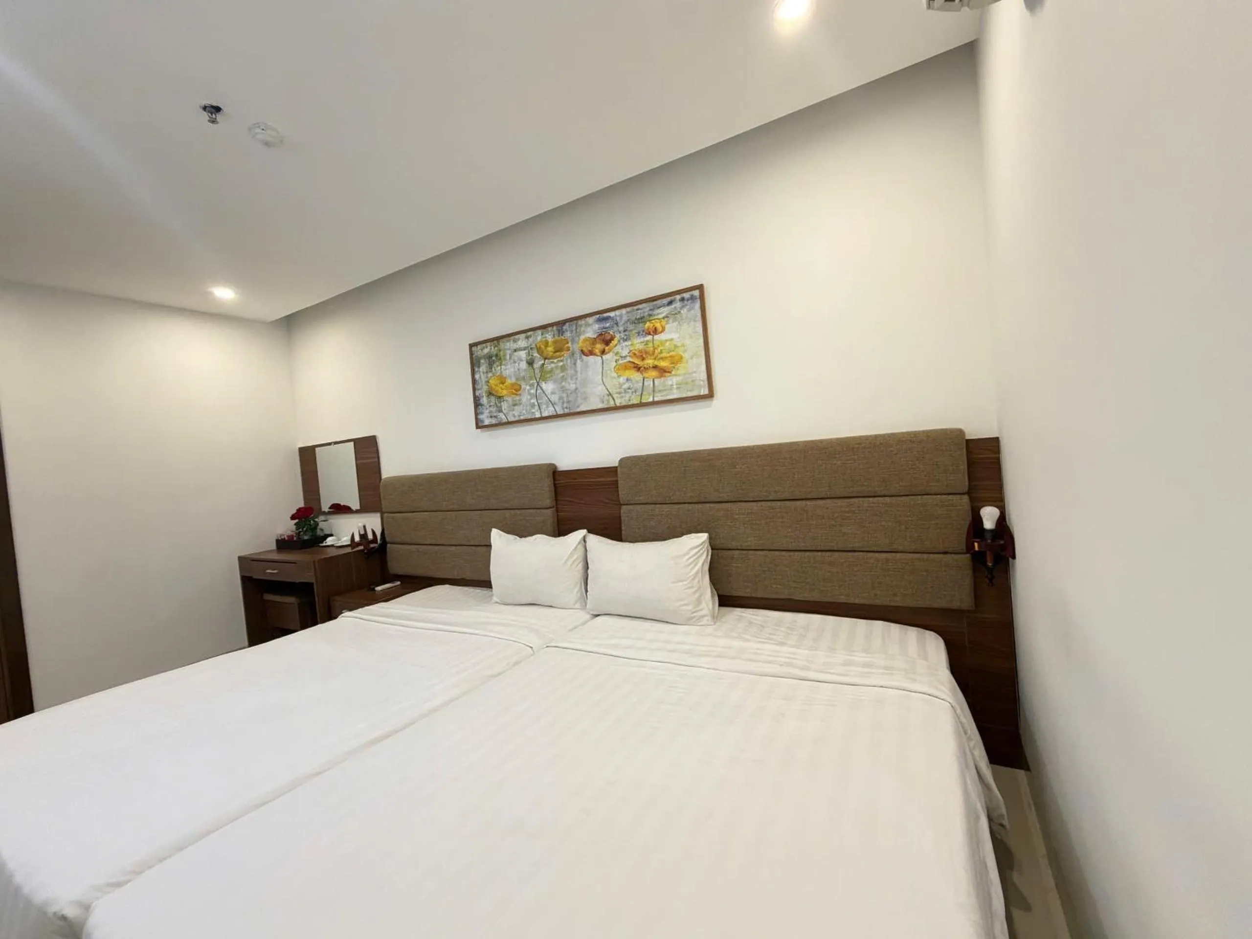 Bed in Platinum Orchid Hotel Danang