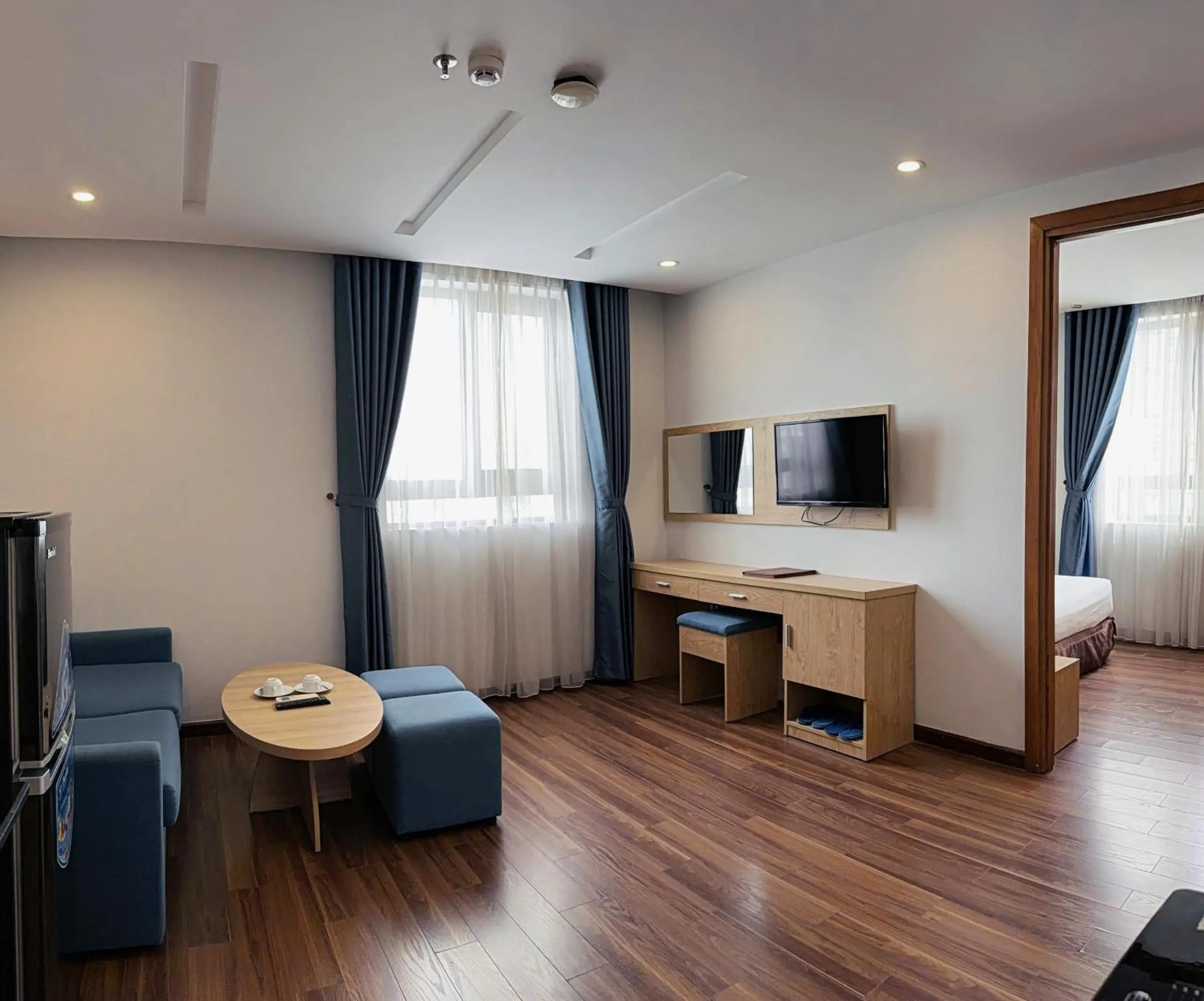 Communal lounge/ TV room in Platinum Orchid Hotel Danang